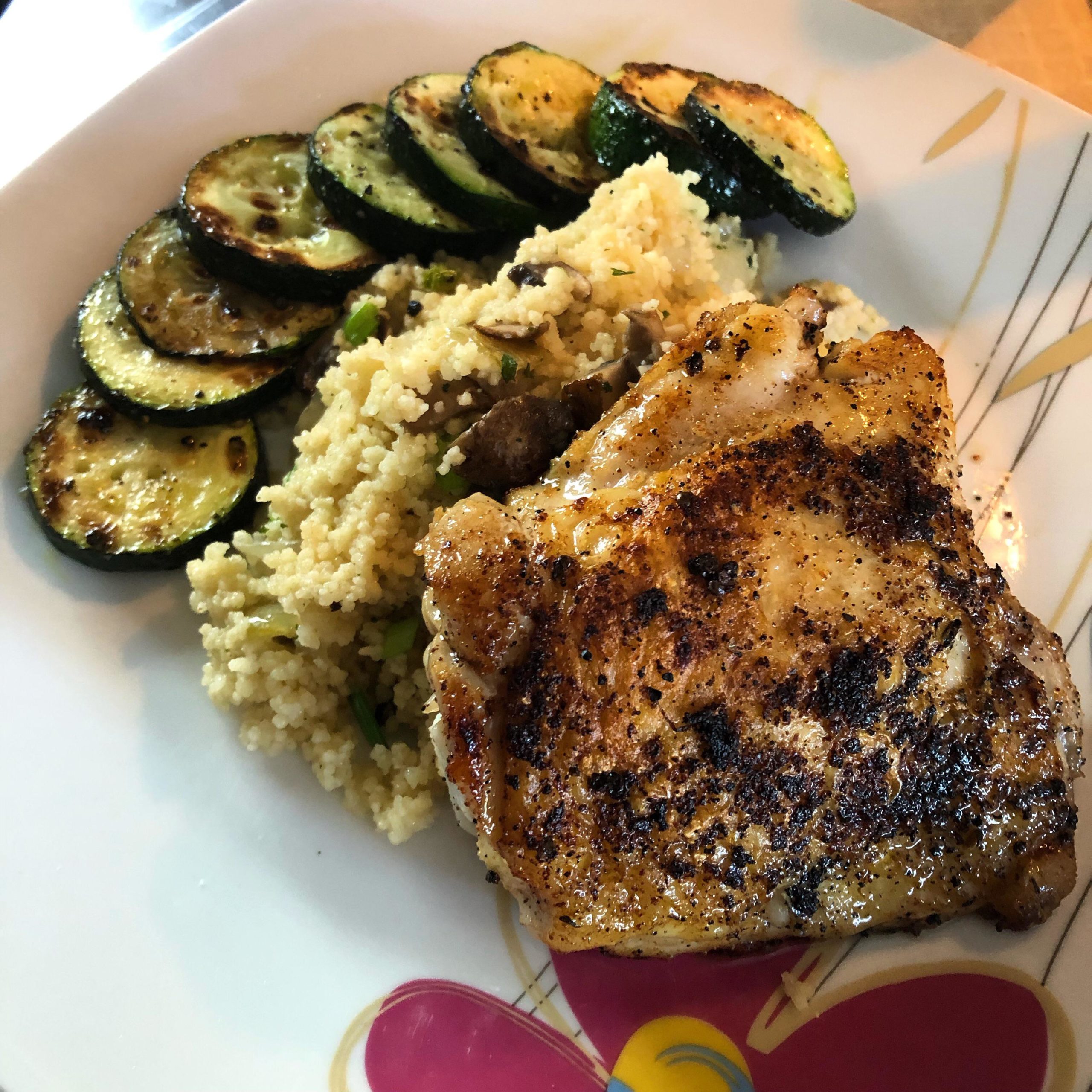 Chicken thigh with garlicmushroom couscous & zucchini Dining and Cooking