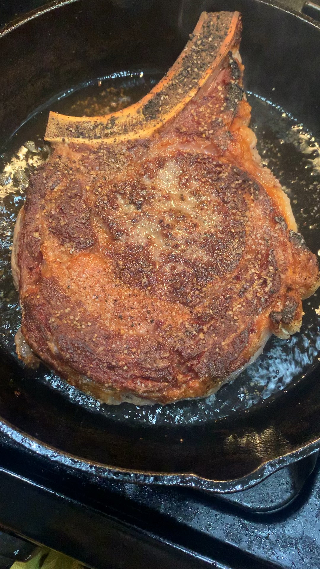 Bone in ribeye in cast iron Dining and Cooking