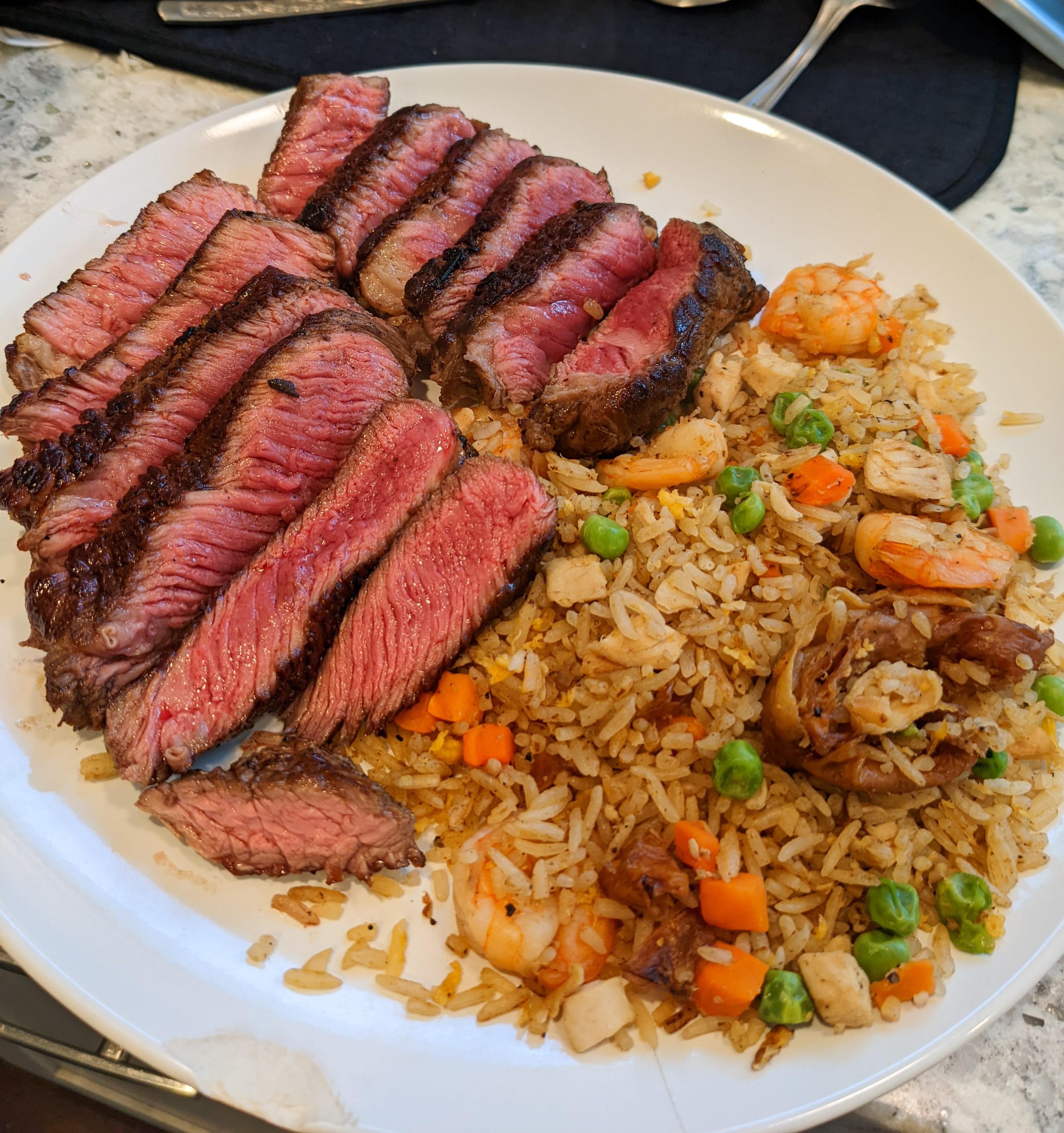 Denver cut steak with Seafood Fried Rice. Dining and Cooking