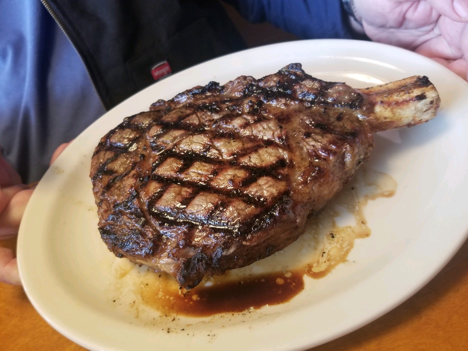 short bone tomahawk steak. Dining and Cooking