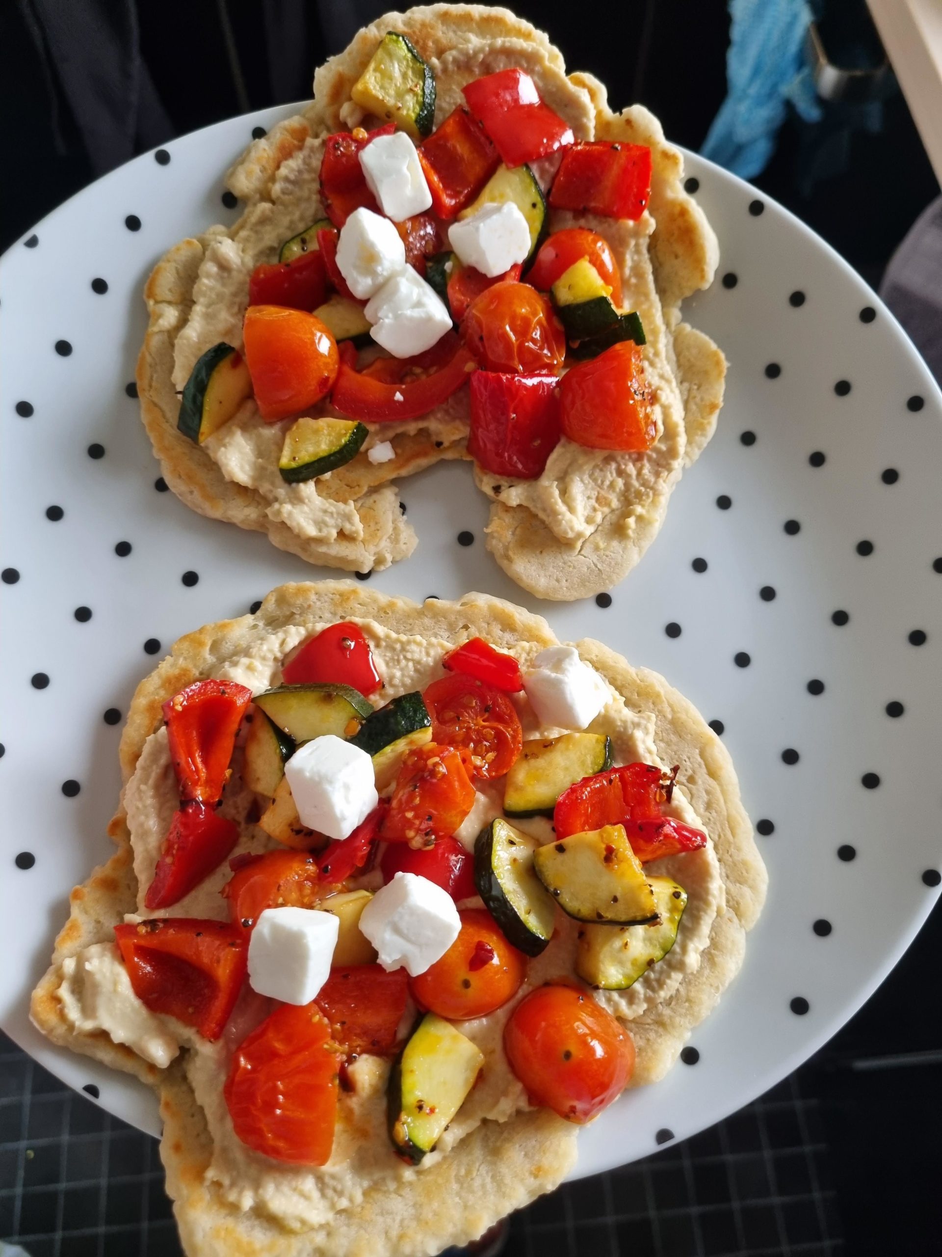 Greek yoghurt flatbreads with hummous, roasted vegetables and feta