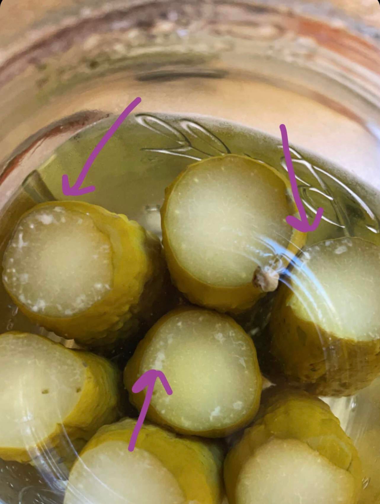 White specks on pickles that I canned in 2021. Is this okay? Dining