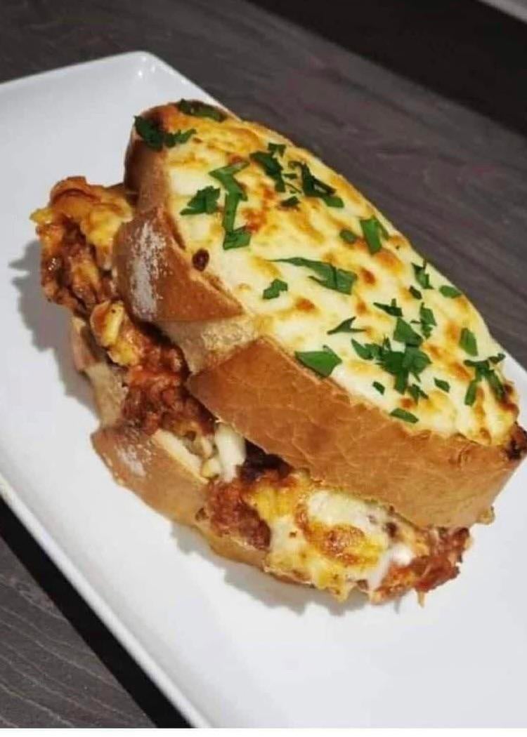 Garlic bread lasagna sandwich. Dining and Cooking