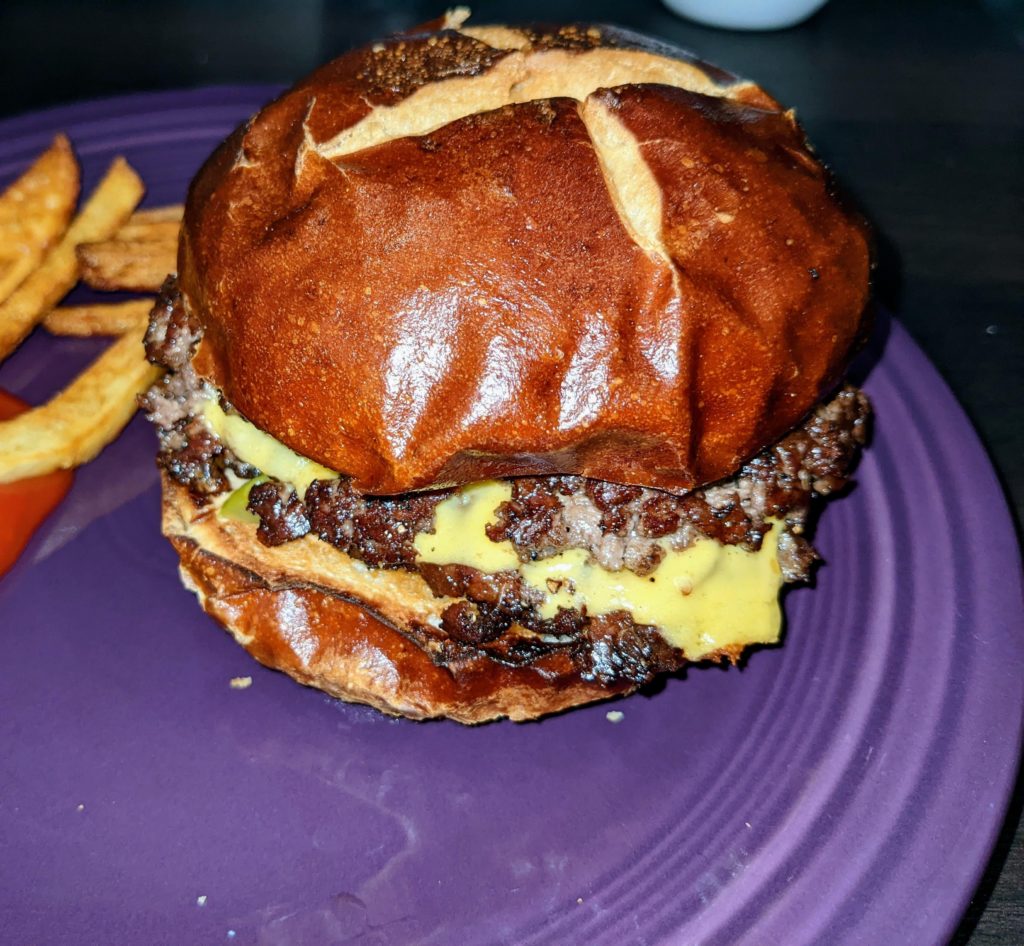 Smashburger on a pretzel bun