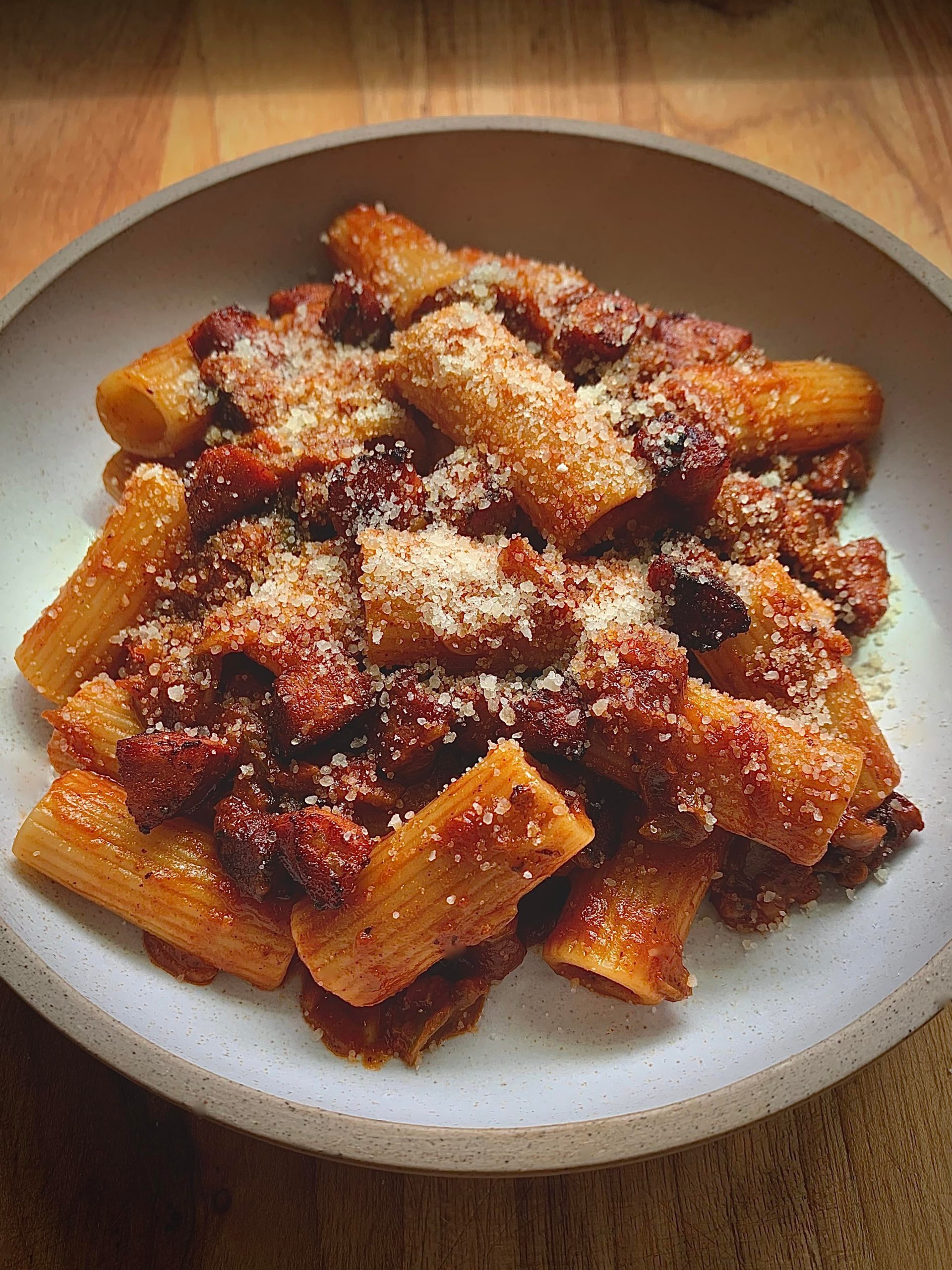 Rigatoni with Spanish sofrito based tomato sauce and crispy linguiça