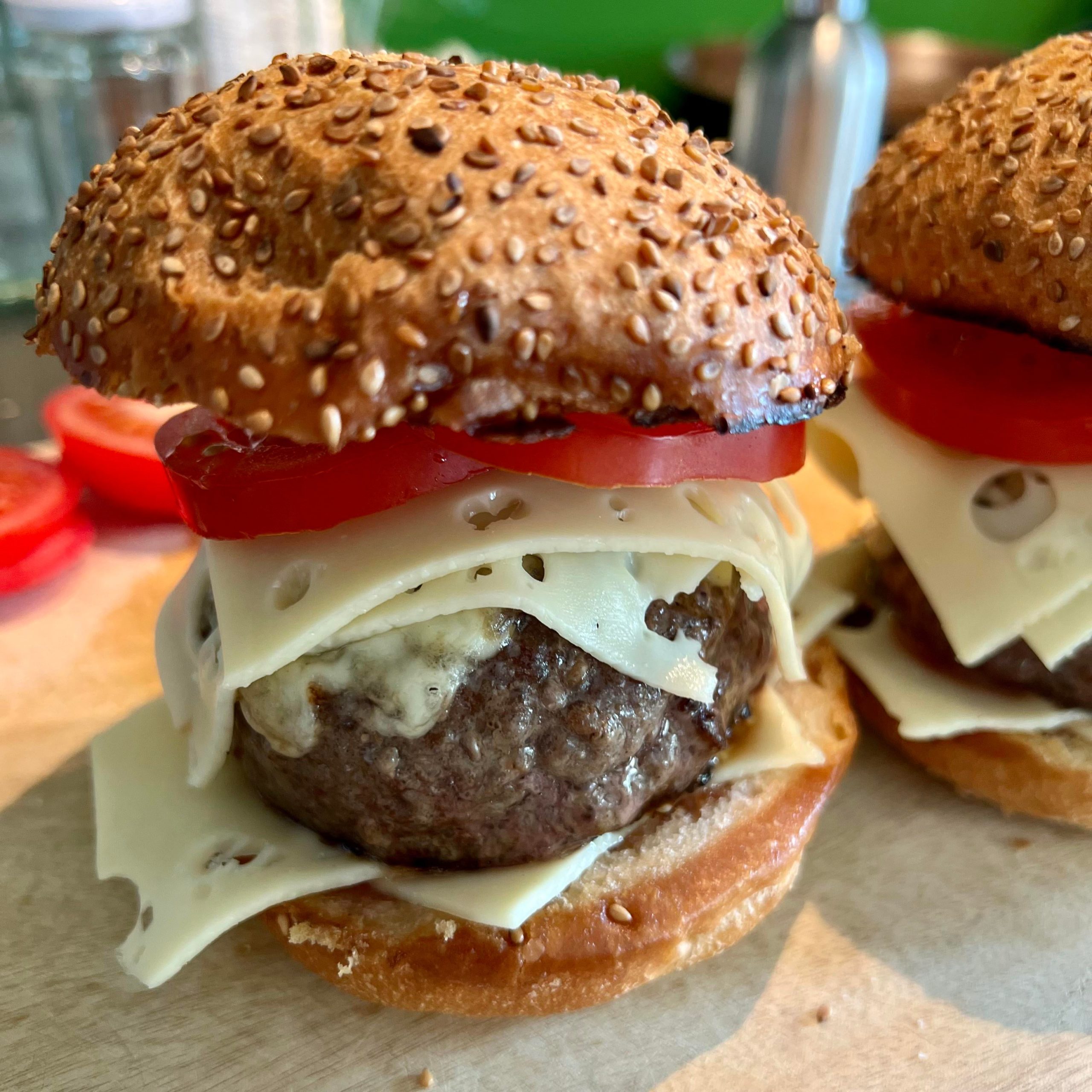 Homemade Chunky Burger with a lot of Swiss Cheese Dining and Cooking