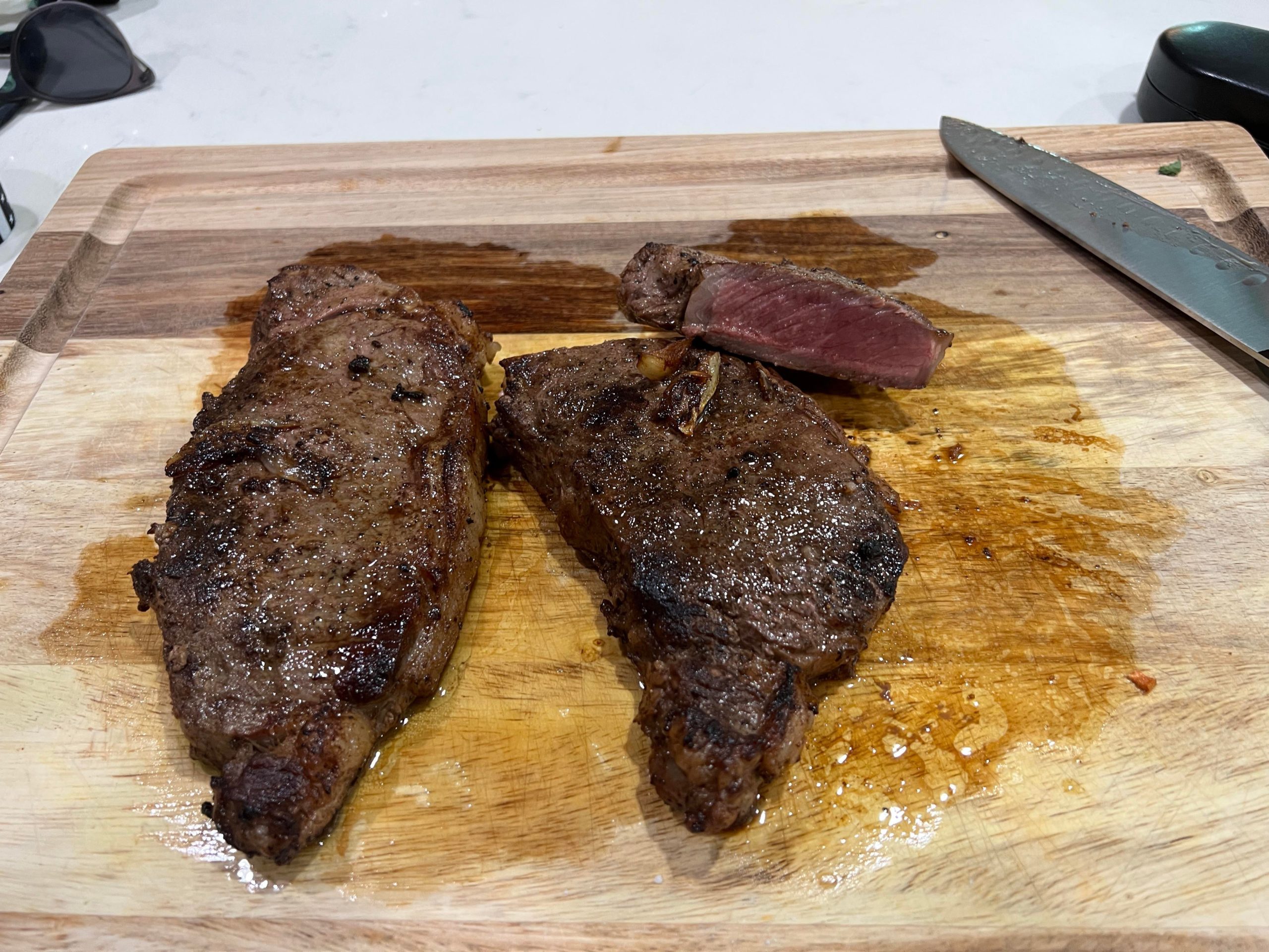 Reverse seared New York Strip Dining and Cooking