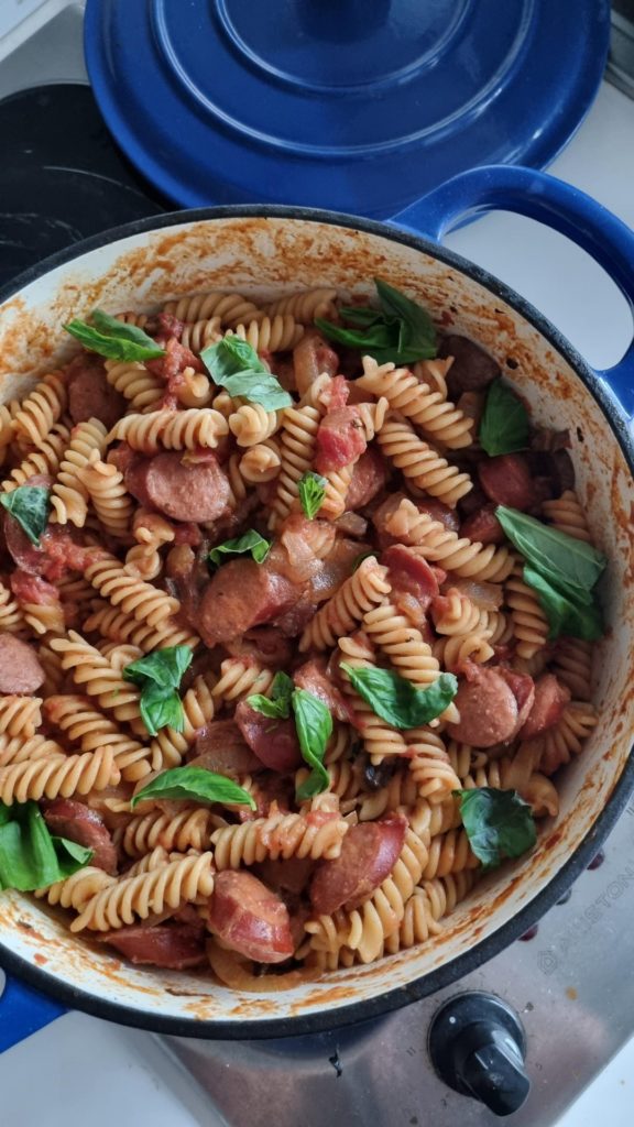 tonight's contribution to a potluck dinner. friends asked for pasta ("either tomato based or aglio olio") - so I made both.