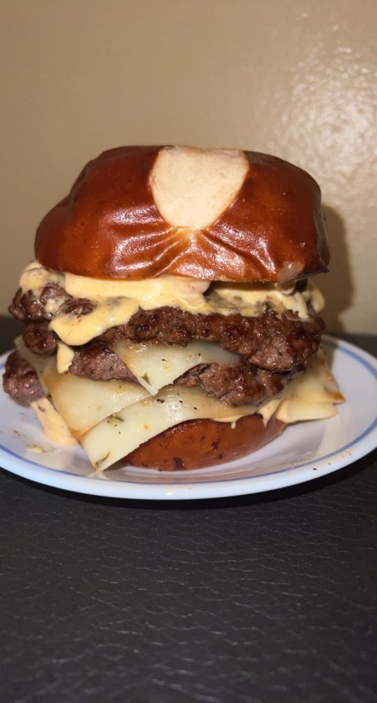 Smash burger made with 80% ground sirloin on toasted pretzel bun. Pepper Jack cheese and some secret sauce.