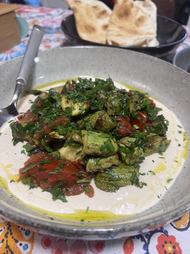 Roasted courgette and tomato salad with yogurt dressing