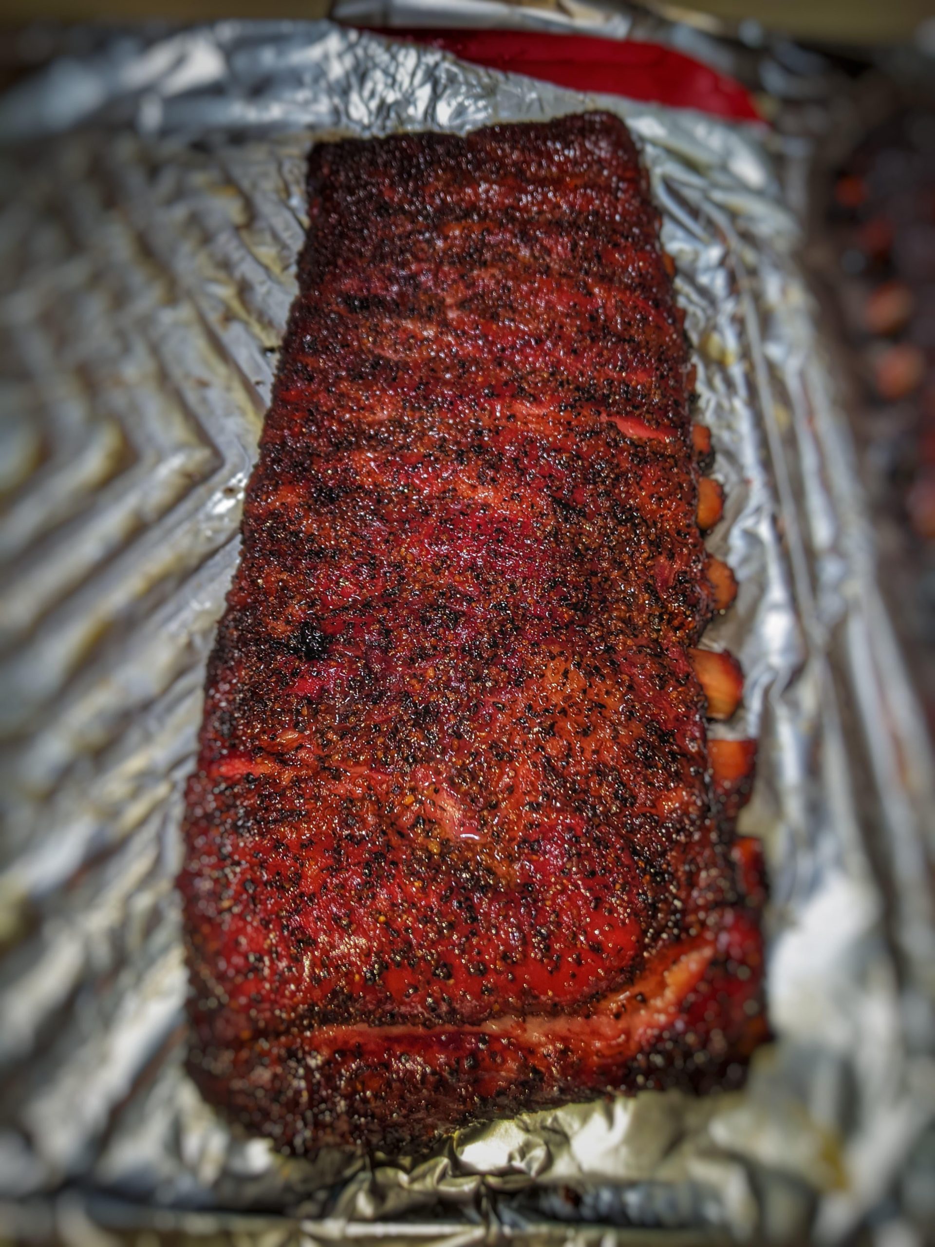 Salt and Pepper spare ribs on the Weber Smokey Mountain. Damn near