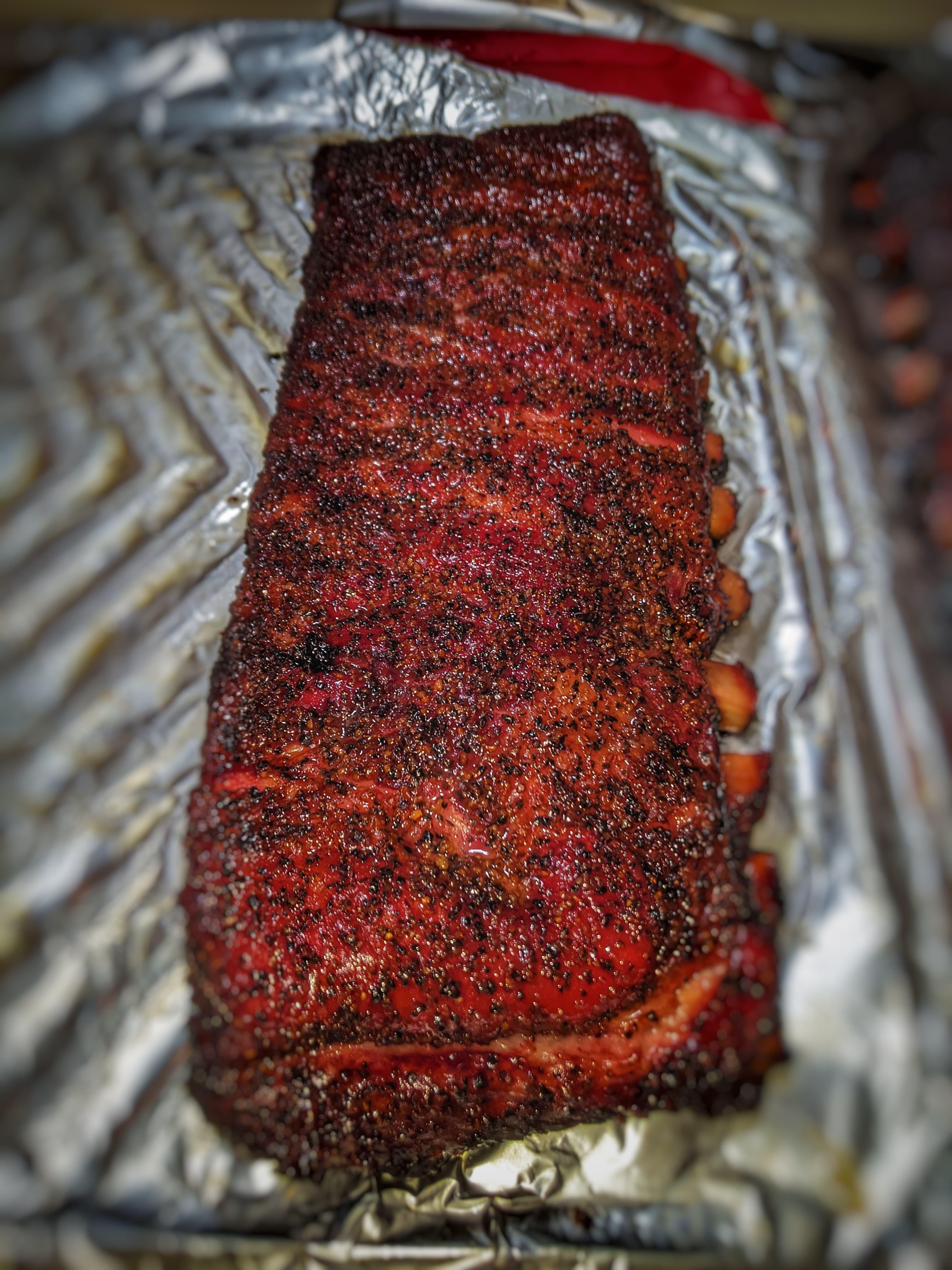 Salt and Pepper spare ribs on the er Smokey Mountain. Damn near