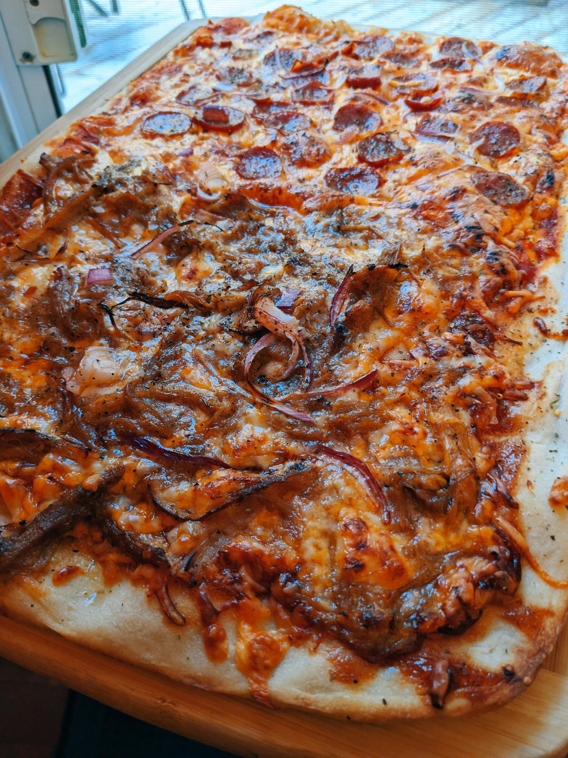 Homemade pizza, half pepperoni half pulled pork Dining and Cooking