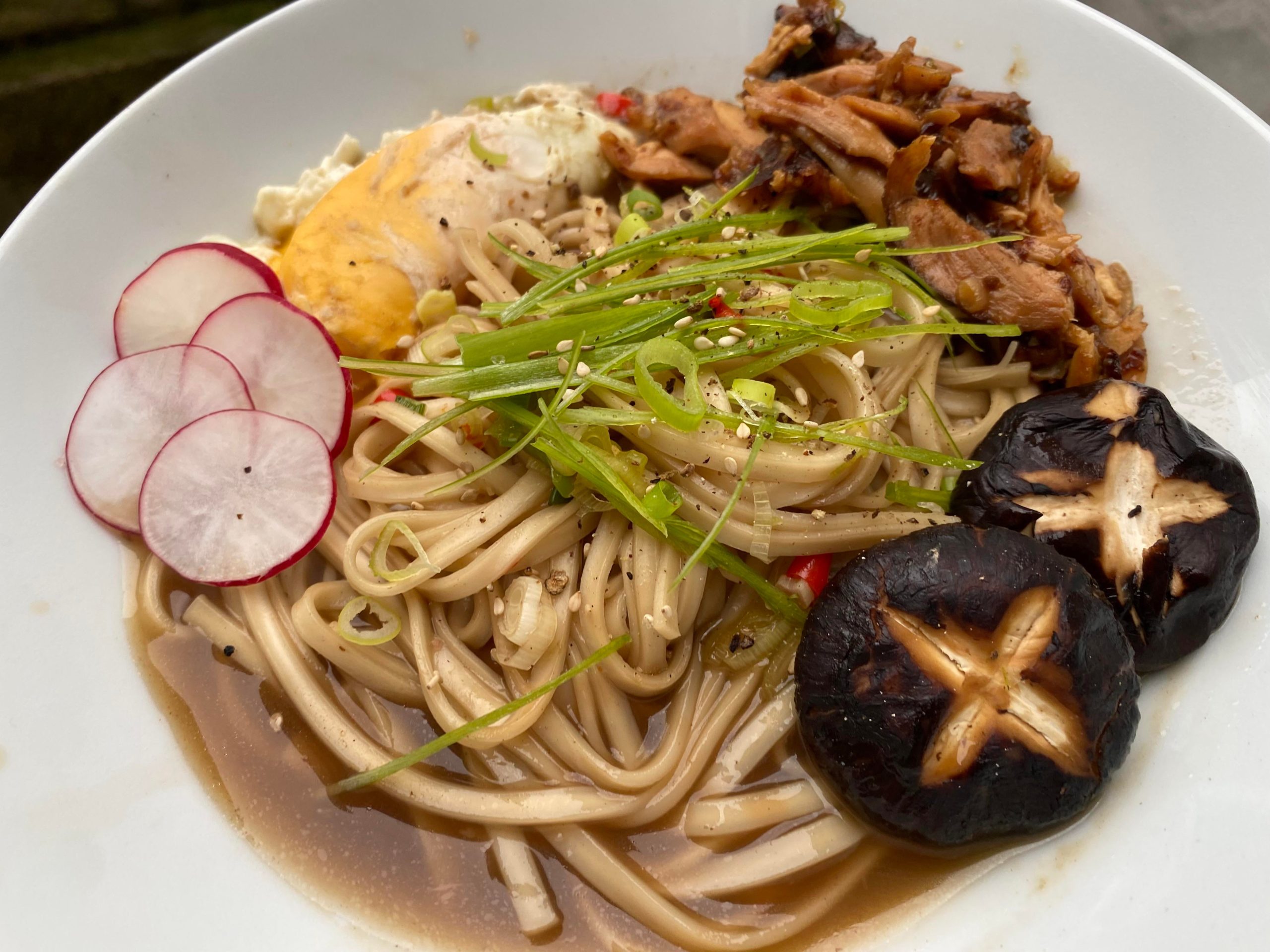 Soba ramen with shredded chicken, mushroom, egg and radish Dining and