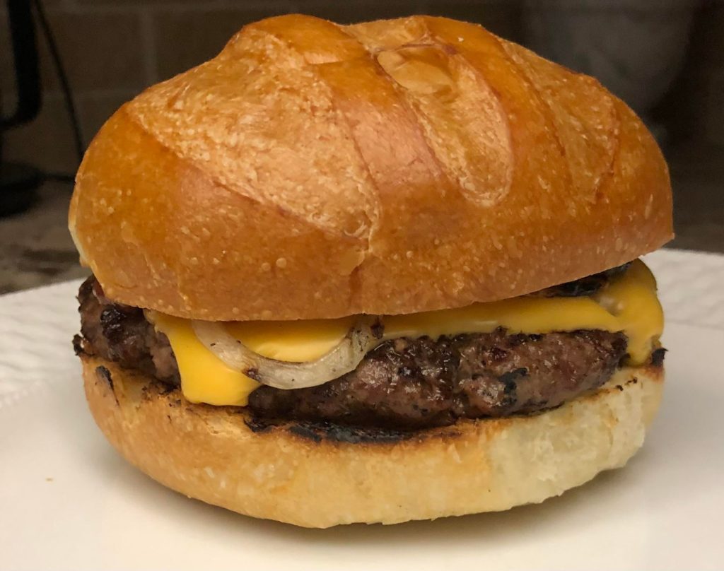Basic cheeseburger with grilled onions by me