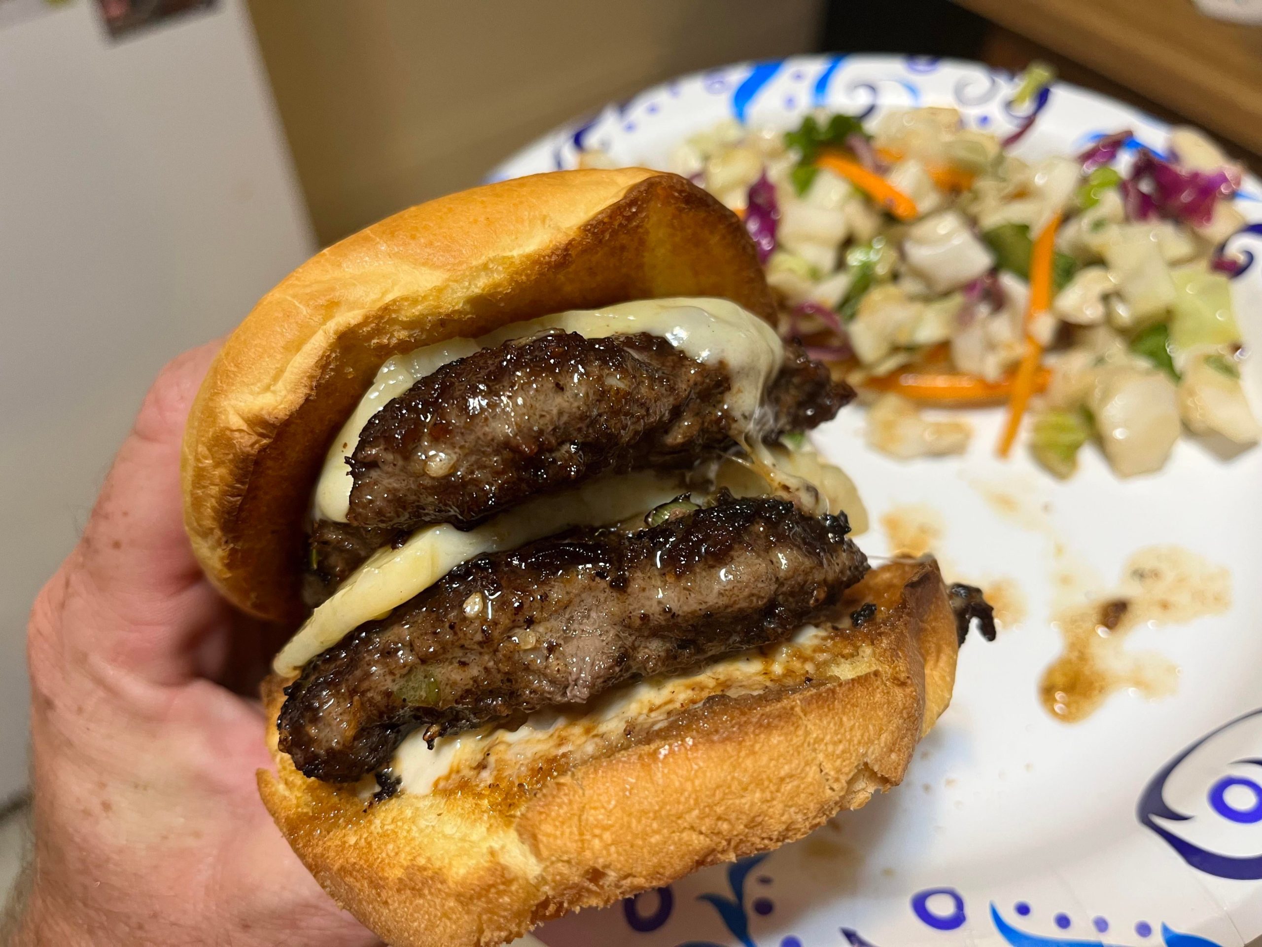 Bulgogi double cheeseburger topped with havarti and tahini sauce on