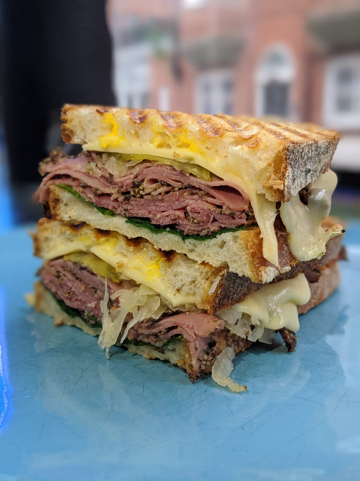 Pastrami Sandwich with Sauerkraut, Swiss Cheese, Pickles and Mustard