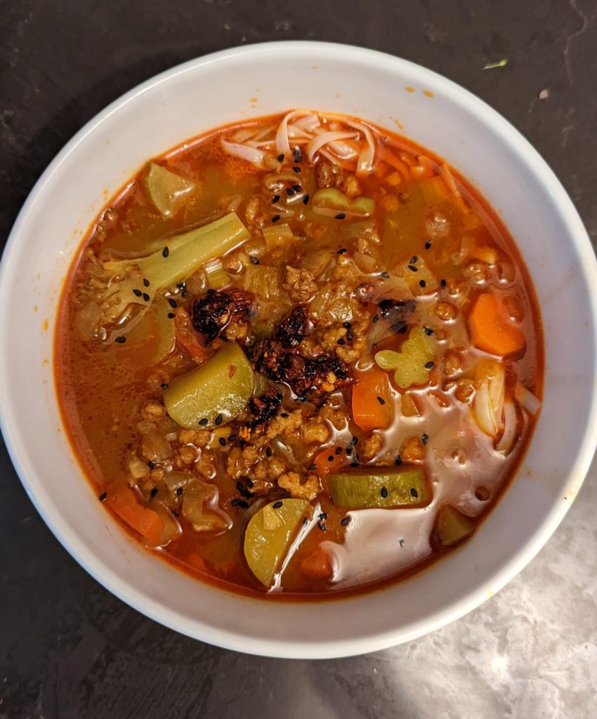 Too many veggies from the garden, throw it all in a pot. Mala pot.