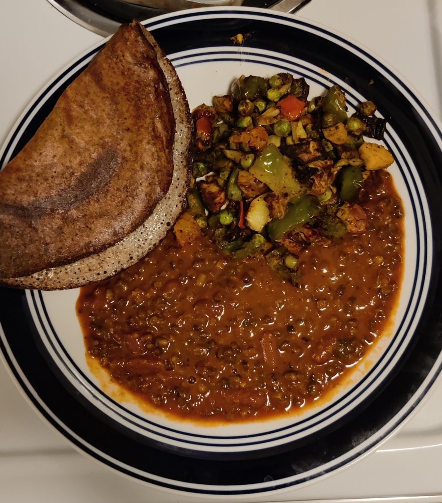 Quinoa-dal dosa (lentil pancake), side of air fried mixed veggies, dal makhani (slow cooked buttery lentils)