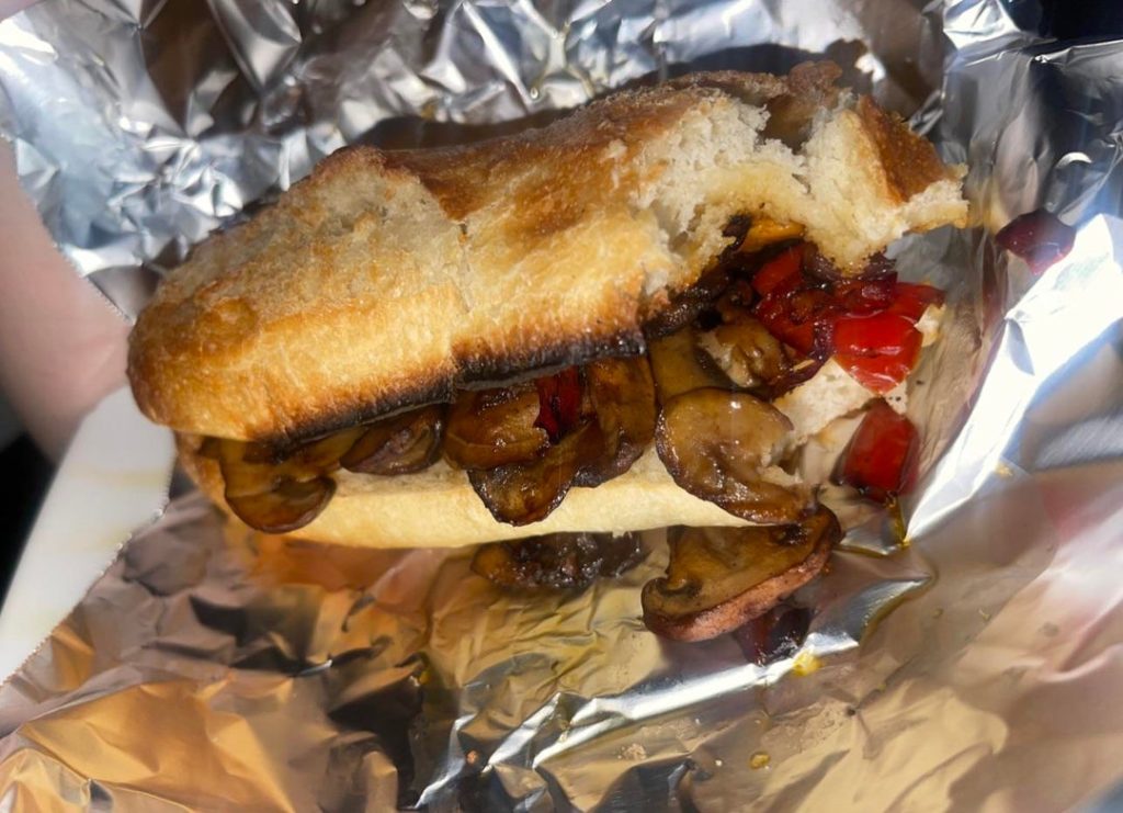 Gormet mushroom sandwich - blue oyst mushrooms, portabella mushrooms, plant based cheese, peppers and onions - bbq sauce is optional