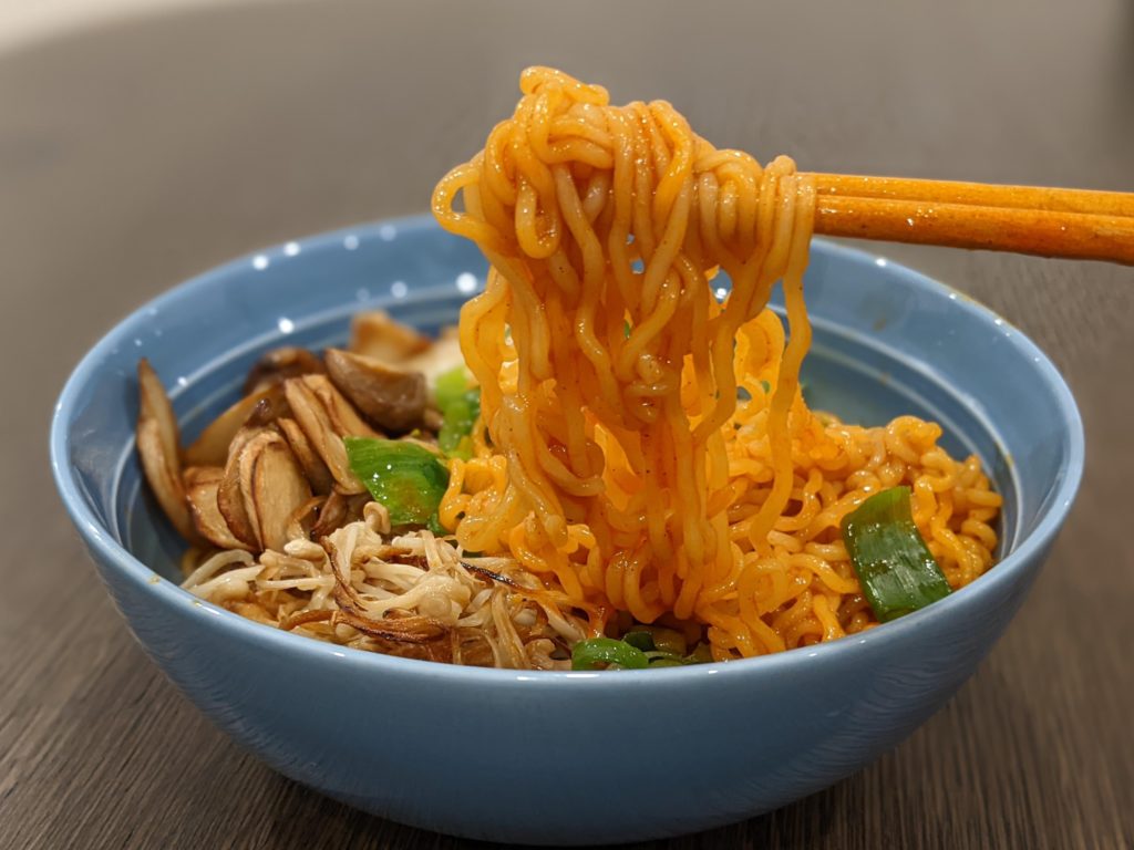 Nongshim premium dry ramen with king oyster mushrooms, enoki mushrooms, long beans and spring onions