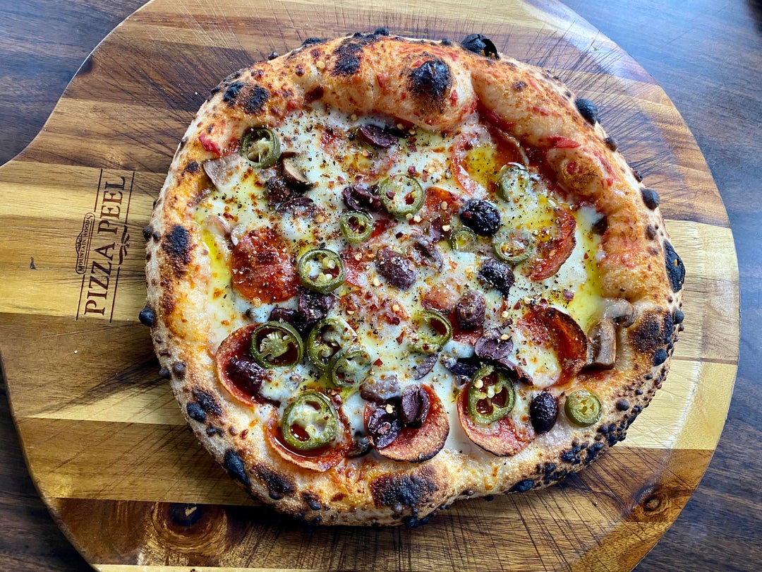 Mushrooms, red onion, black olives, jalapeños and pepperoni cooked in