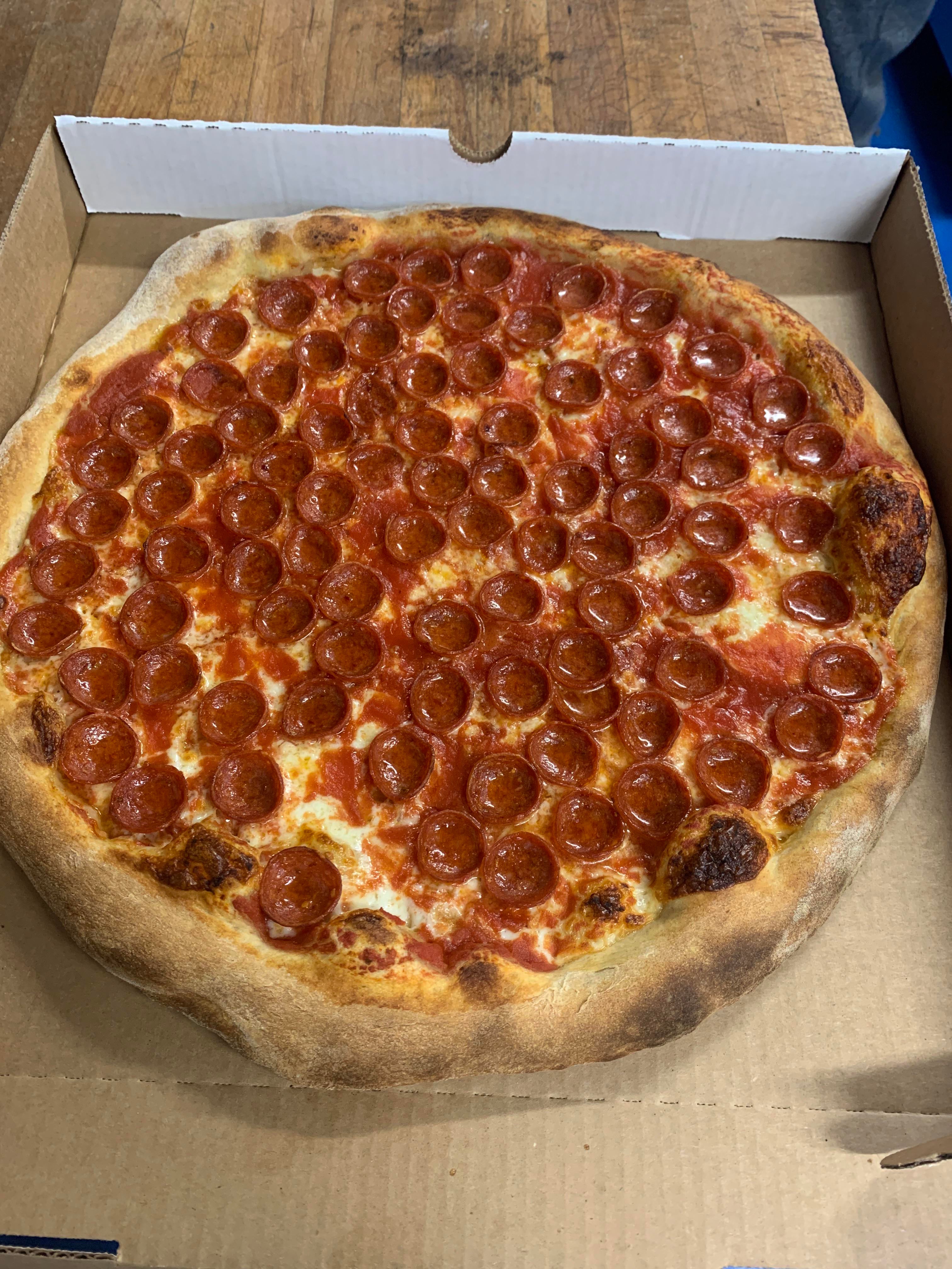 “Old world” pepperoni from Pizzeria Davide in Pittsburgh. Cheese on the bottom and sauce on top