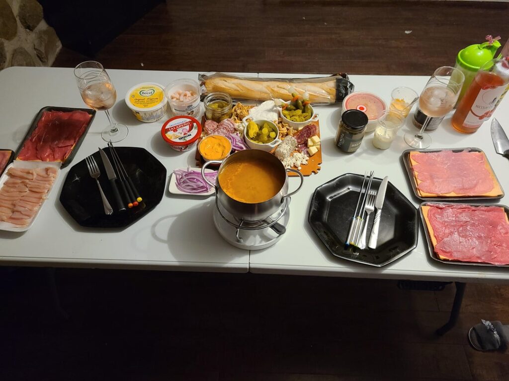Fondue for the win, with a charcuterie and cheese board