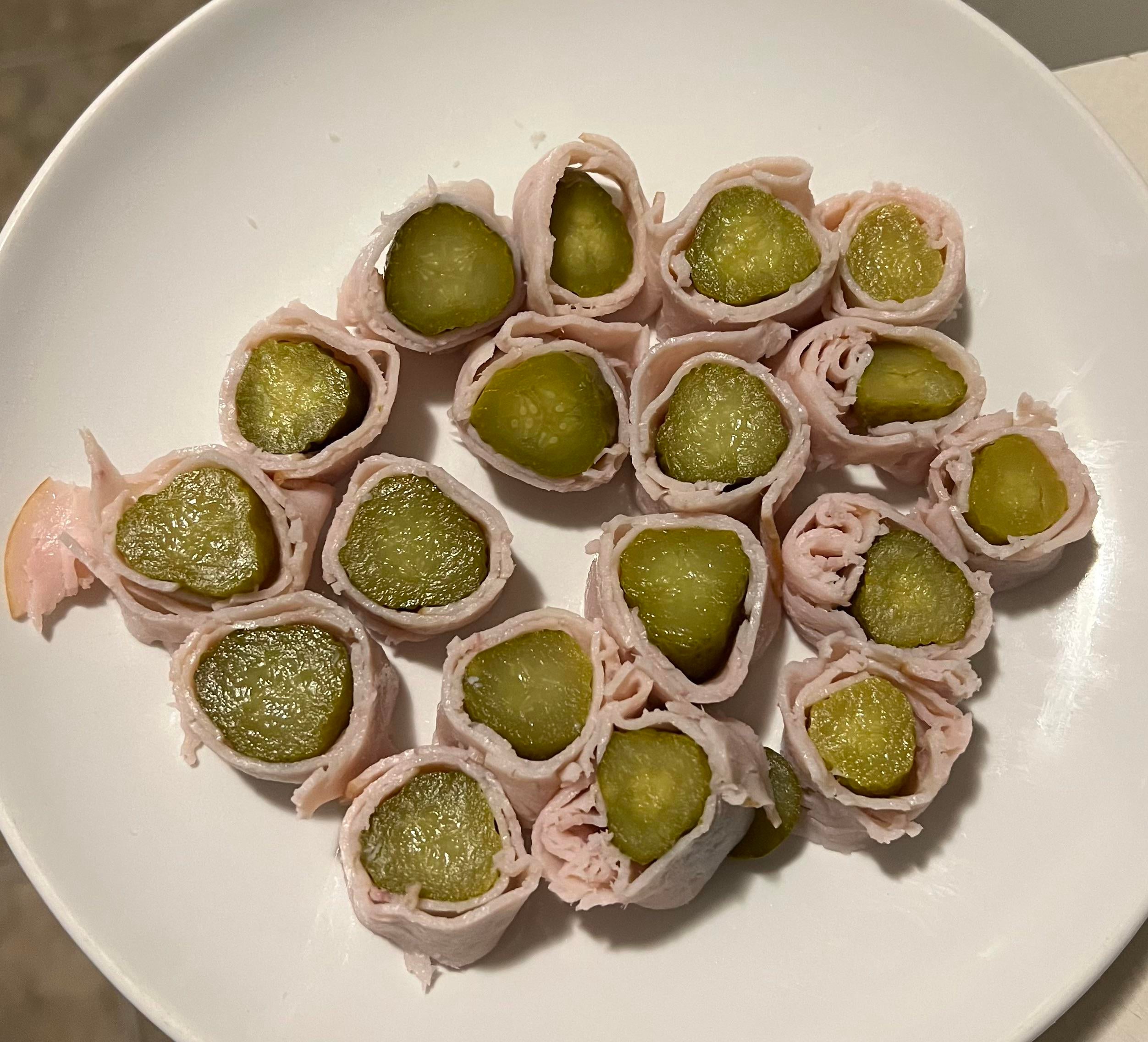 60ish Calorie Snack Dill pickle wraps with turkey lunch meat. Dining and Cooking