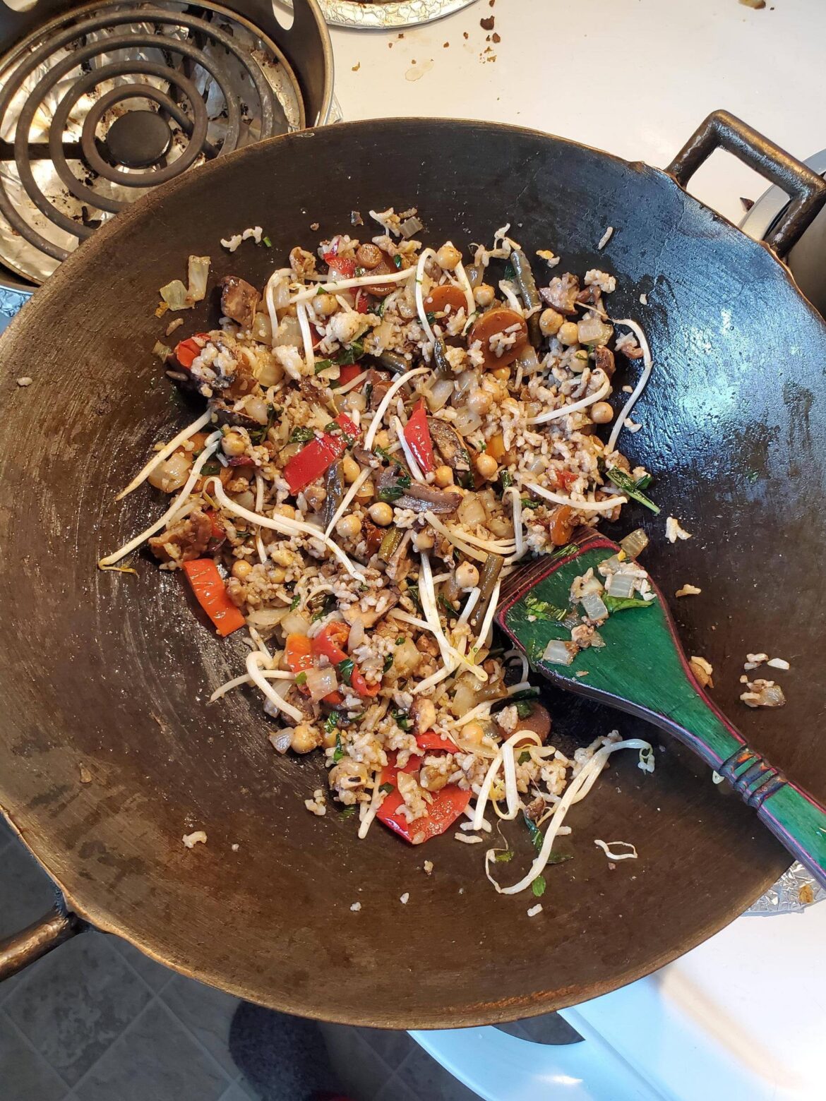 Quick lunch, just stir fried some leftover rice and veggies. I highly recommend everyone get a wok and learn how to use it, it's so easy and delicious