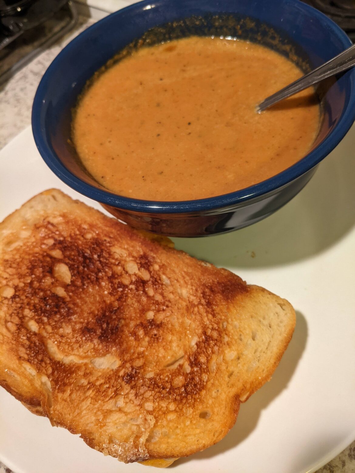Spicy sweet potato-carrot soup with grilled cheese