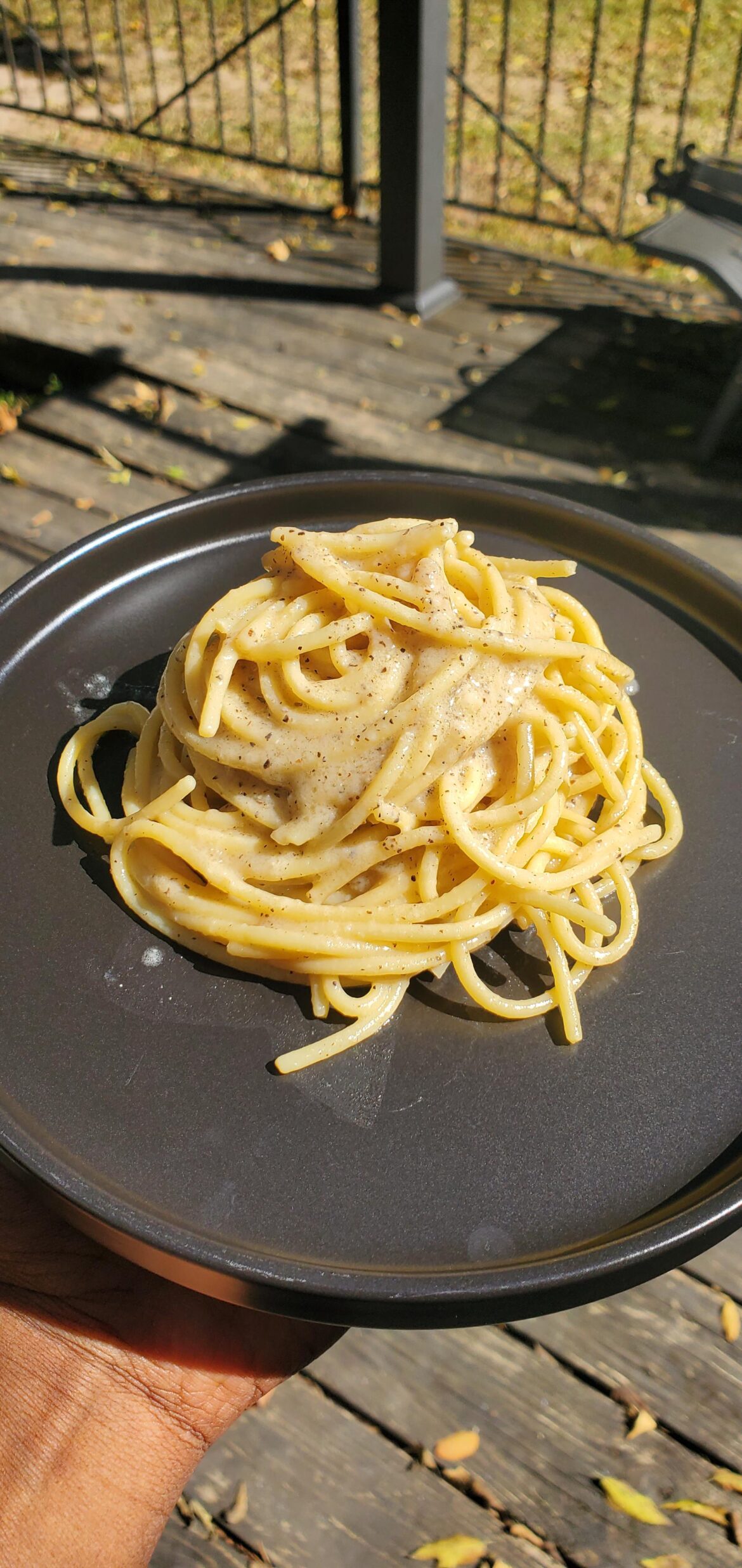 spaghetti with garlic, Parmigiano, Pecorino and a Parmigiano broth with black pepper.