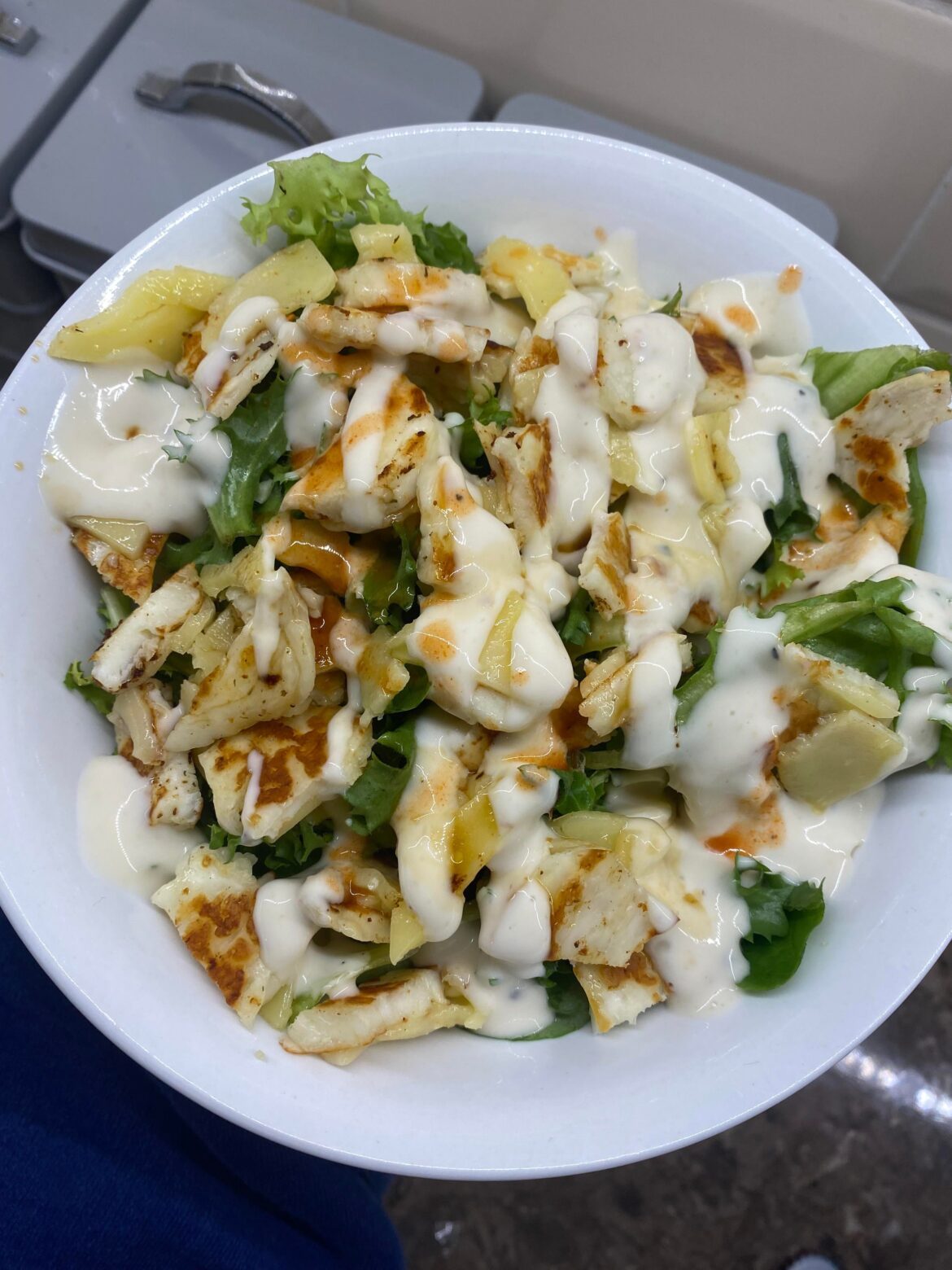 Halloumi, lettuce & spinach salad bowl with some low fat vegan Caesar dressing! (& ofc some hot sauce)