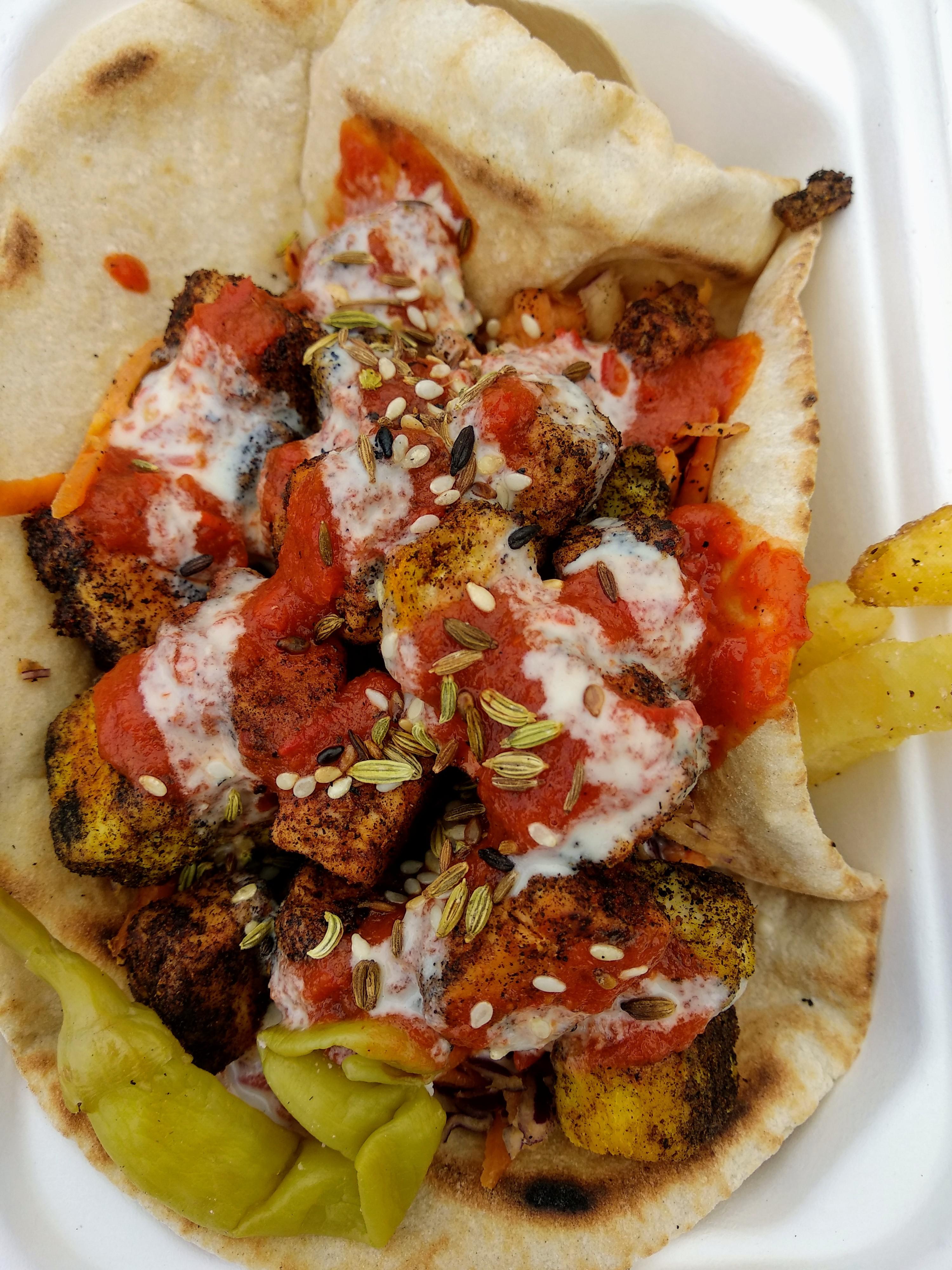 Not chicken shish kebab with pickle and sauces from the local street ...