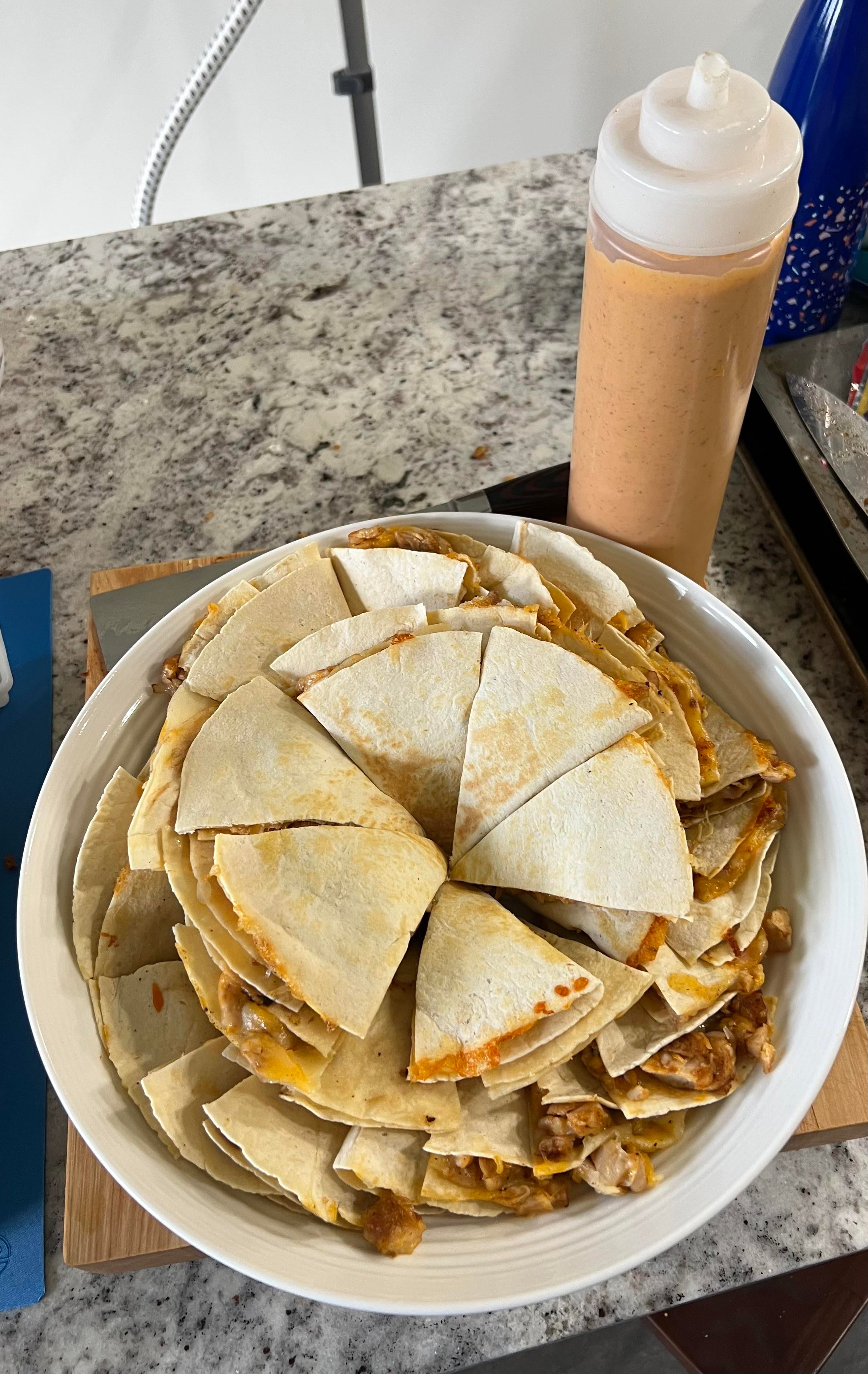 [homemade] Taco Bellstyle quesadillas, with the sauce, for a party