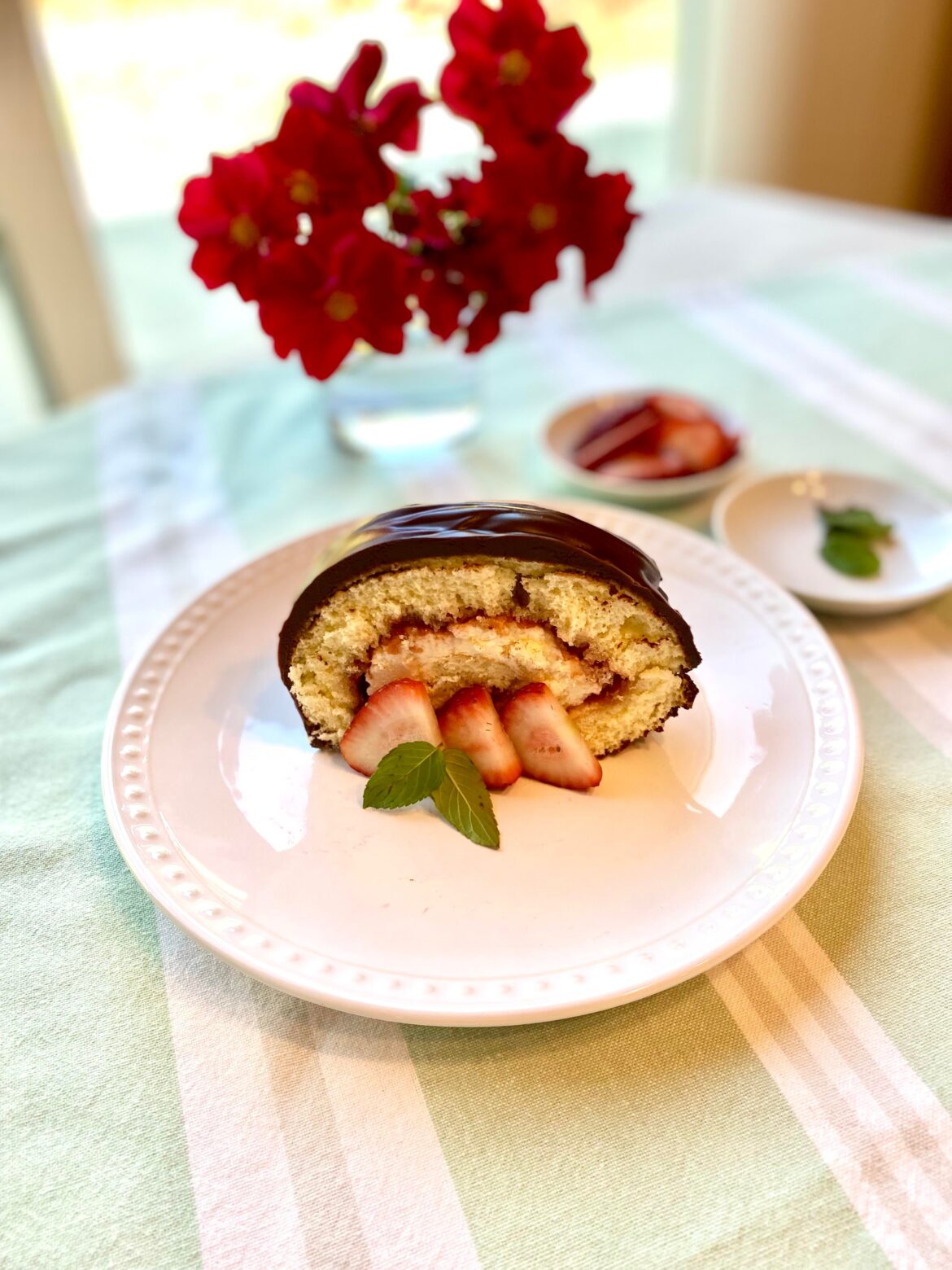 Gansito-style Roll Cake (sponge filled with strawberry jam and whipped cream in a chocolate shell)