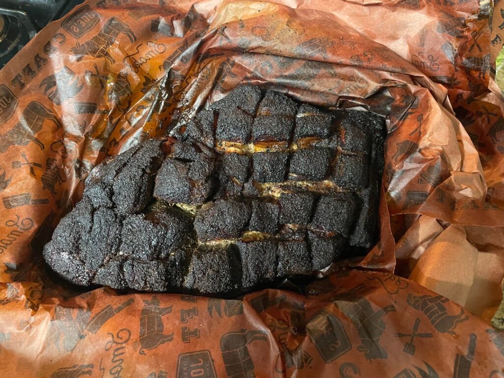 First go at bone-in pork shoulder (6 lbs), using a reverse vortex, snake method, on a Weber kettle.