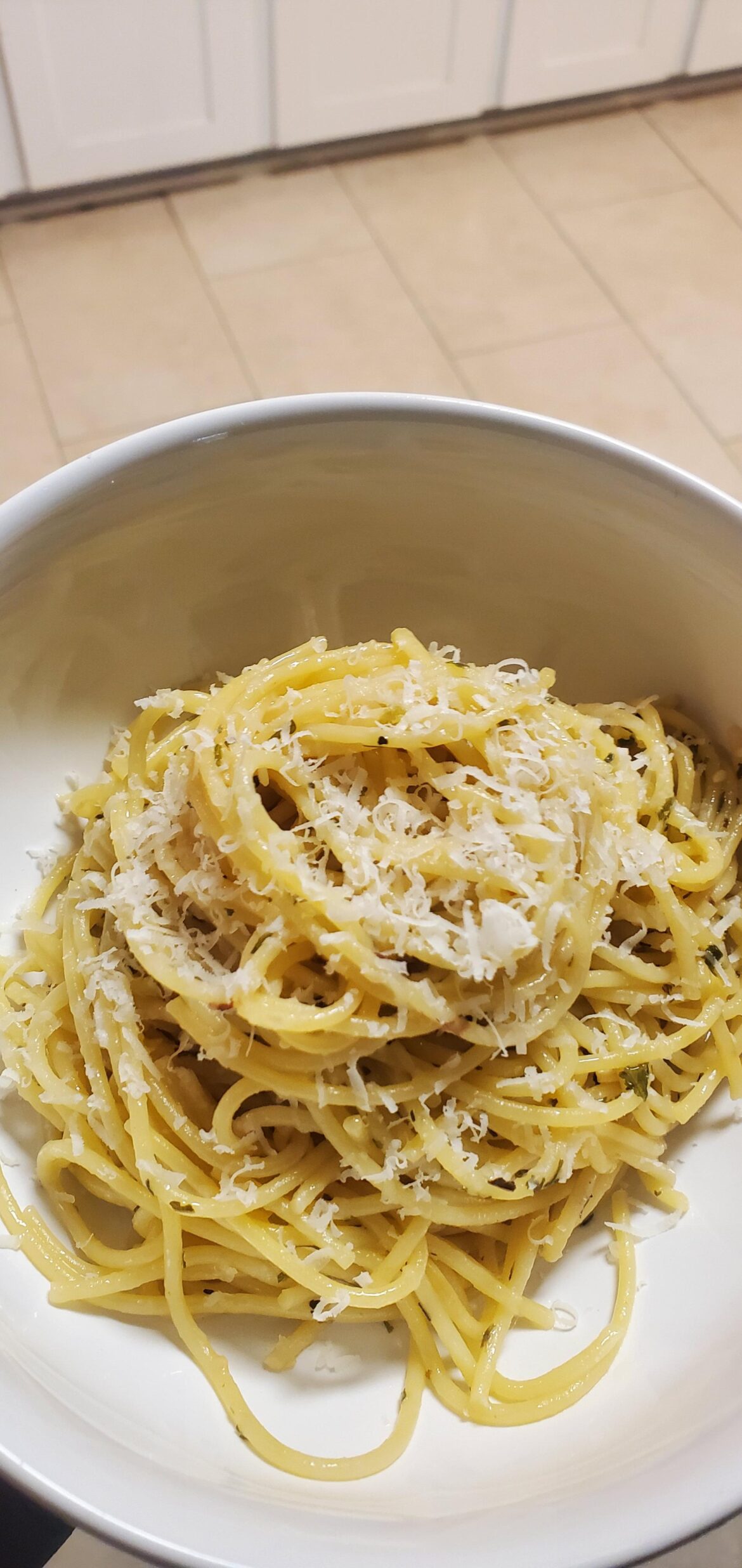 is it still aglio e olio with cheese on top?