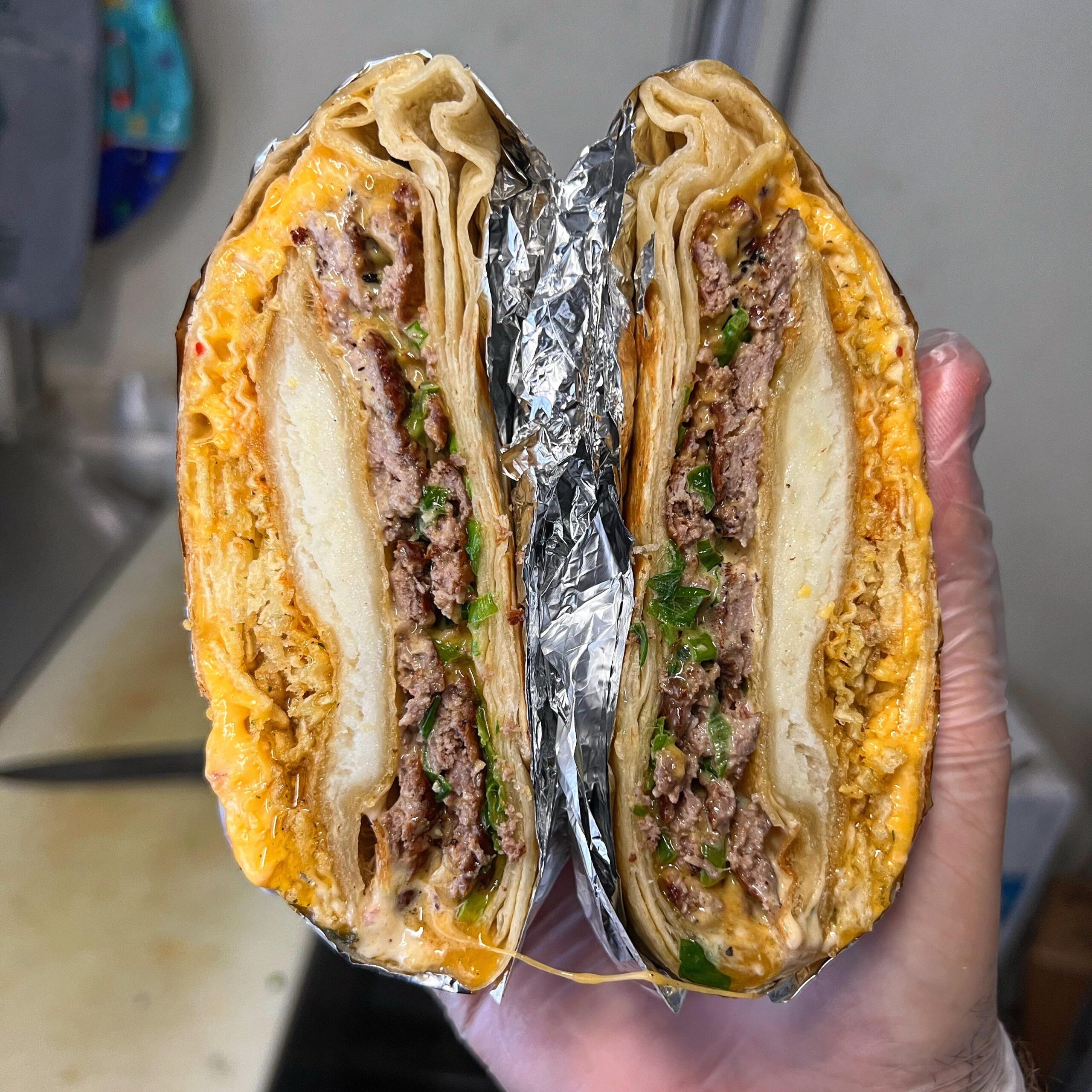 Loaded baked potato burger in crunchwrap form. Dining and Cooking