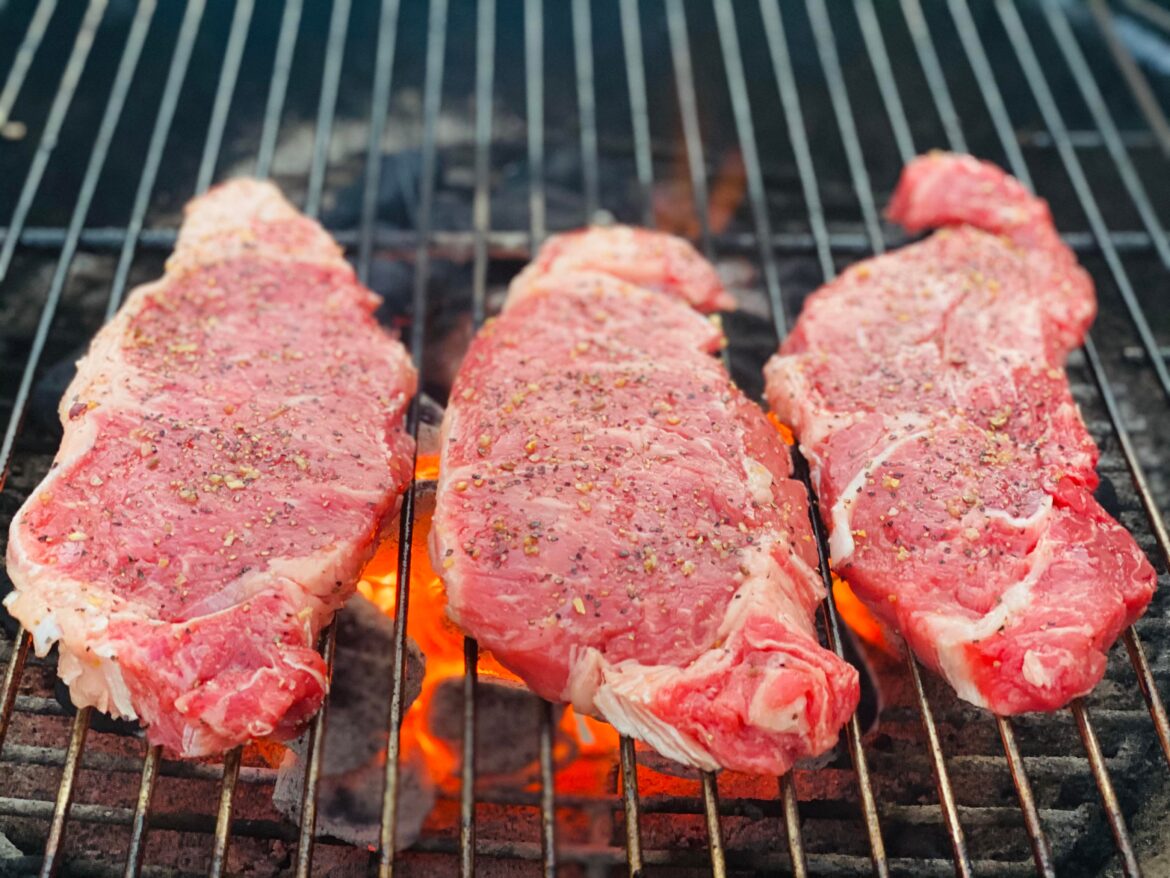 NY Strip steaks on the charcoal grill!