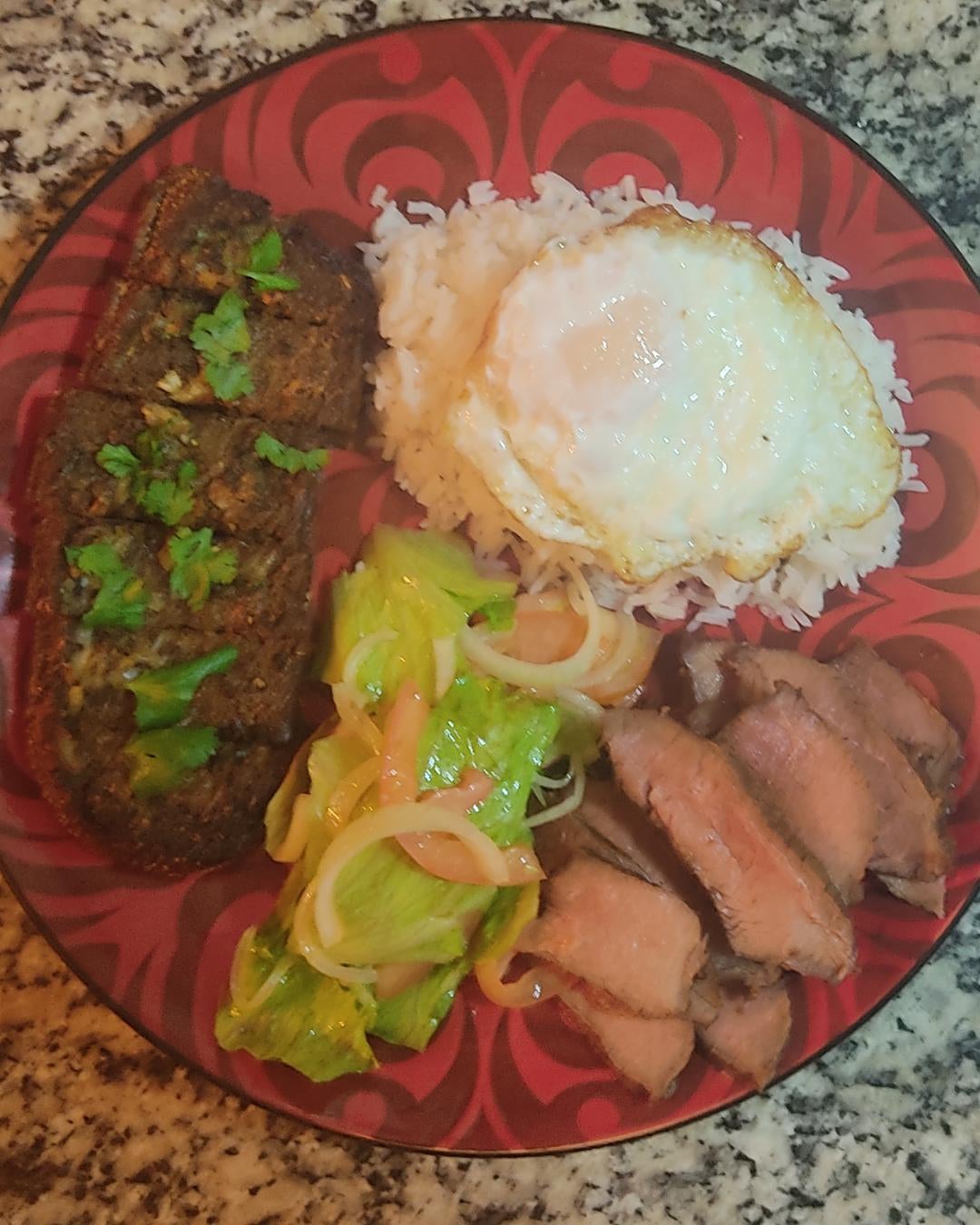 Garlicky Australian bread, dry aged steak, soft fried egg, rice and a