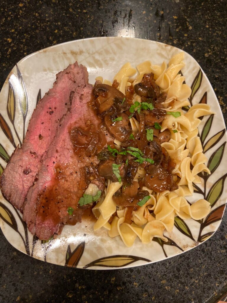 Roast beef and mushroom gravy with egg noodles.