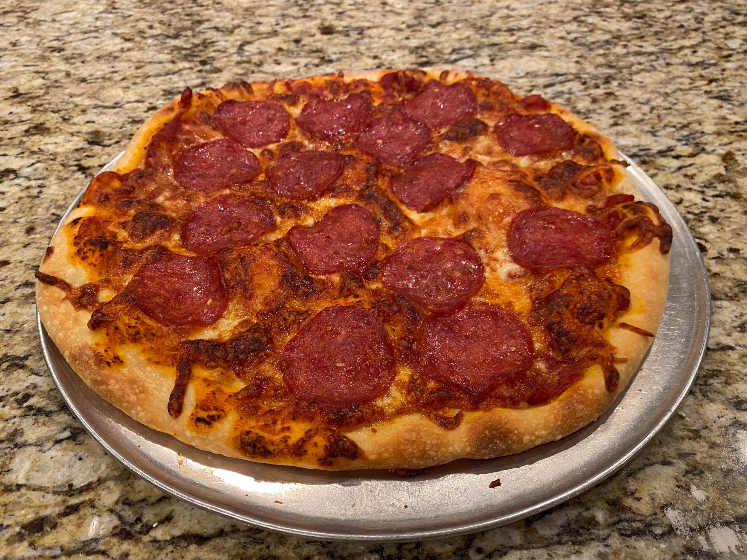 Trader Joe’s dough, cheese, sauce, etc. Lazy but not bad. Dining and Cooking