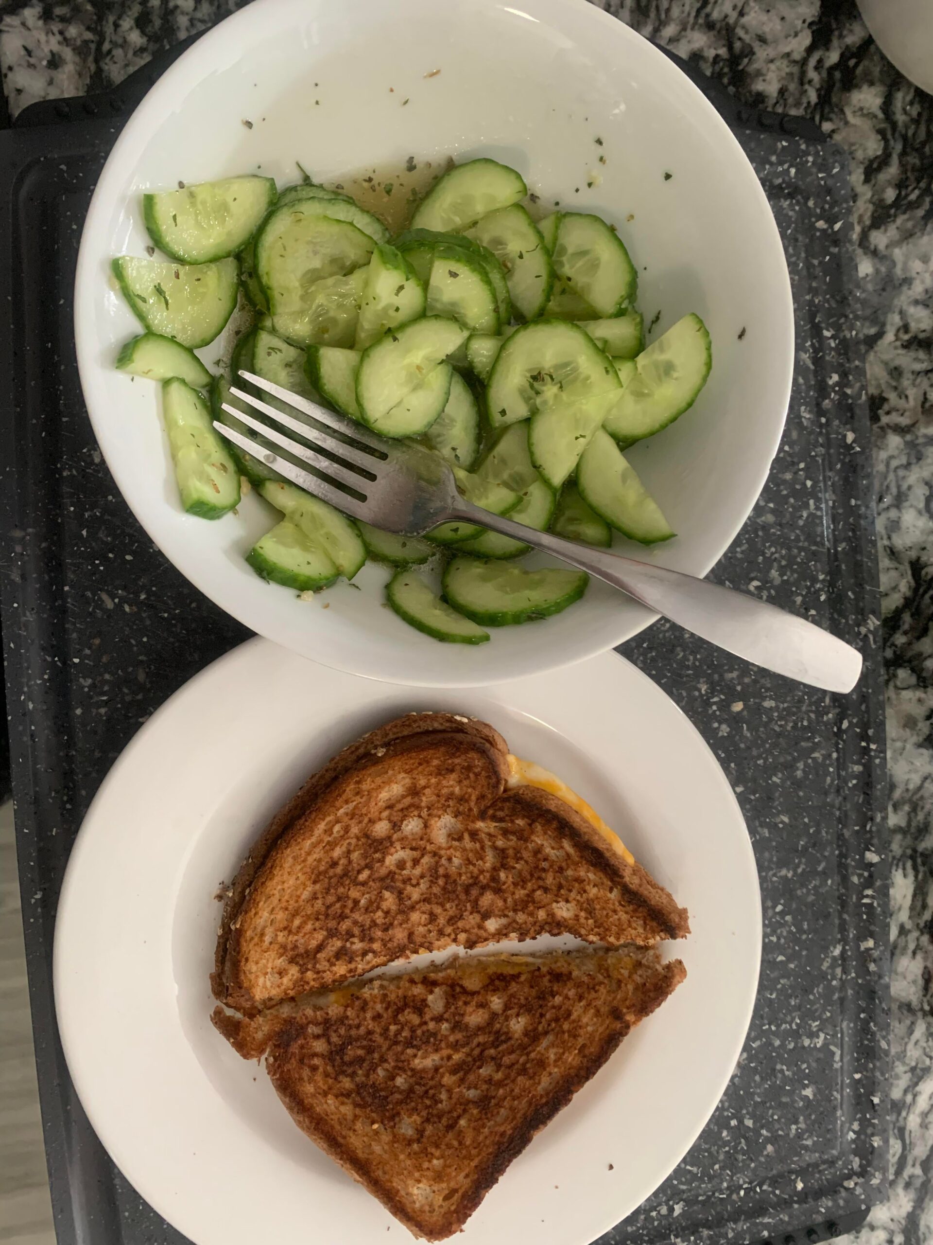 Cucumber salad (80 cals for 2 tsp olive oil) + grilled cheese (110 for
