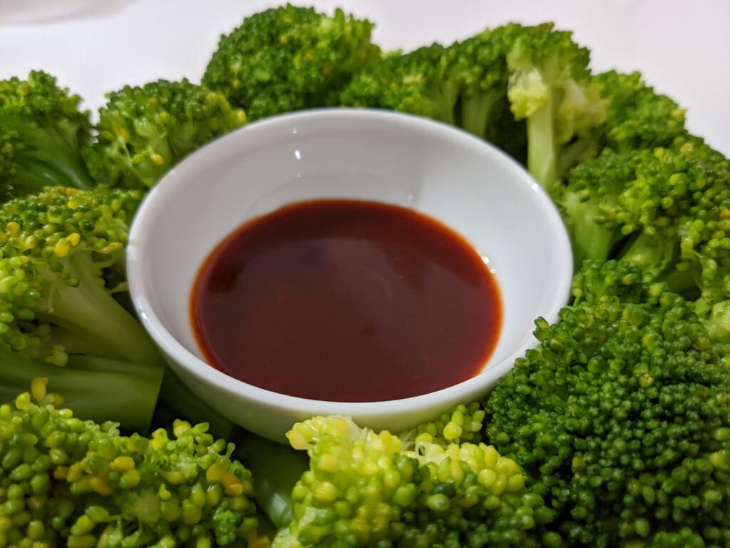 Broccoli with sweet sour and spicy dipping sauce