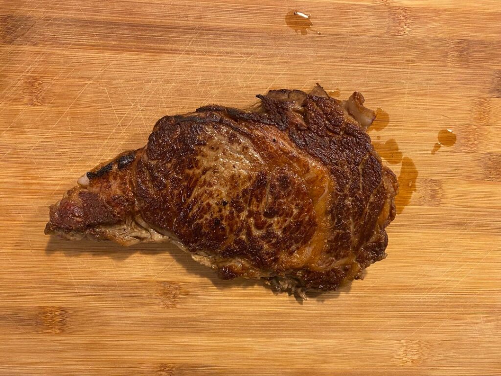 Used a weight when searing my steak, made a great crust.