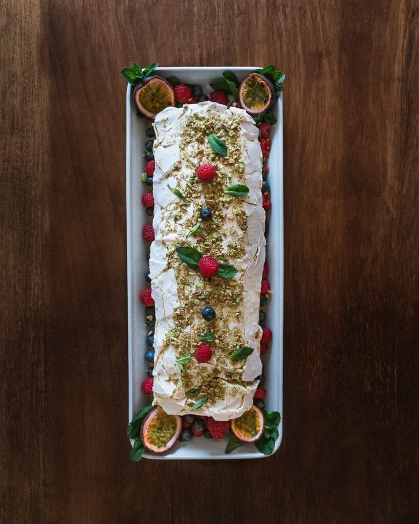 Meringue Roulade with Lemon Curd, Berries & Crushed Pistachio