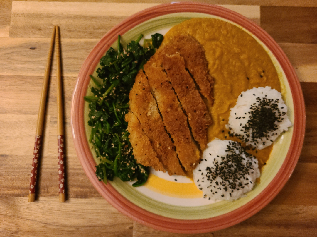 seitan katsu served with sushi rice and gomaae (spinach salad with