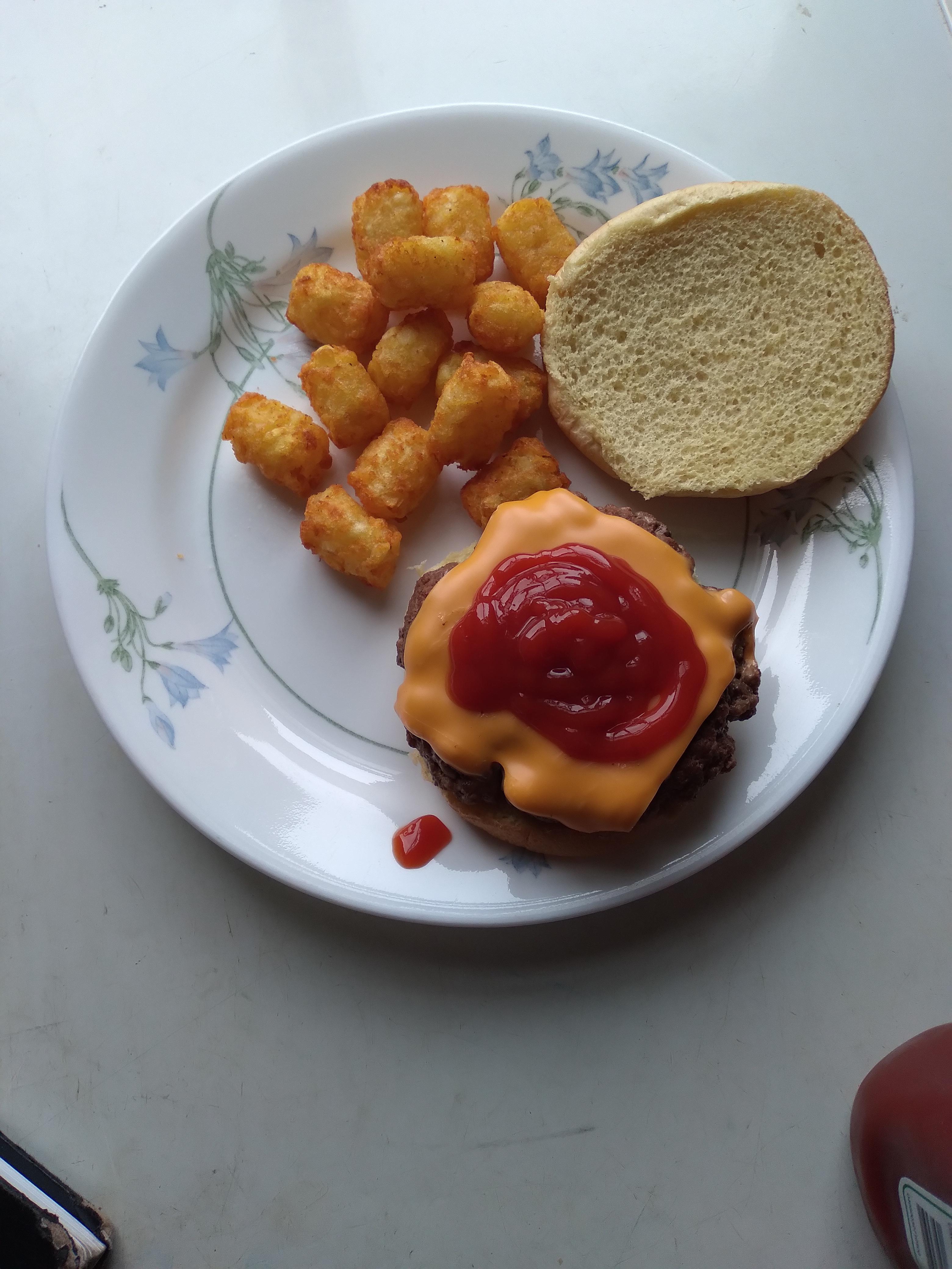 A tasty burger seasoned with garlic, season salt, and pepper Dining