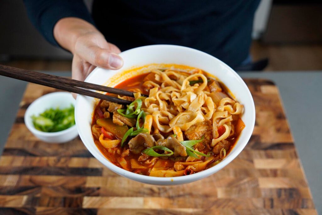 Spicy pork kalguksu with knife cut noodles from scratch